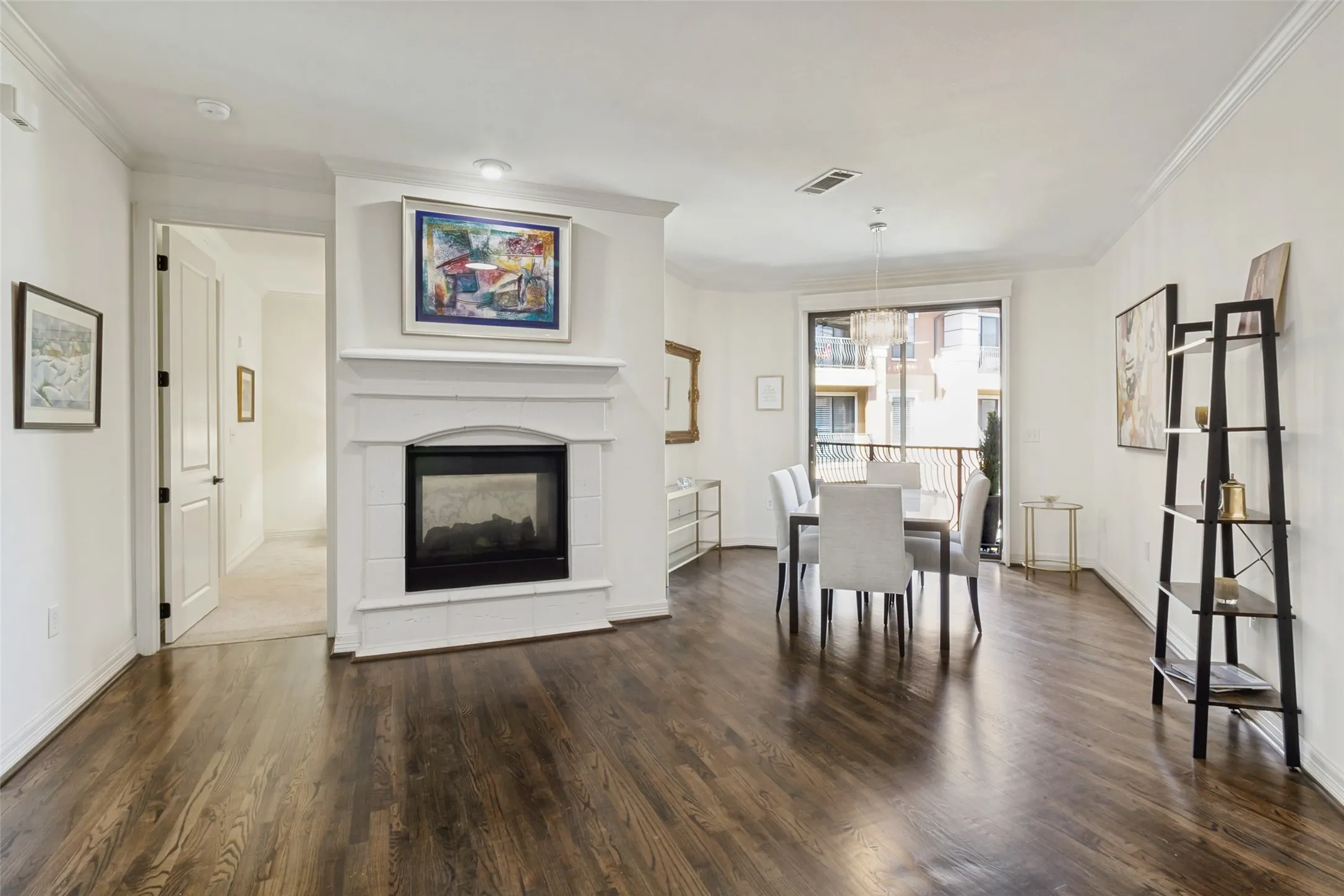 One of the two fireplaces open to the dining and second master.