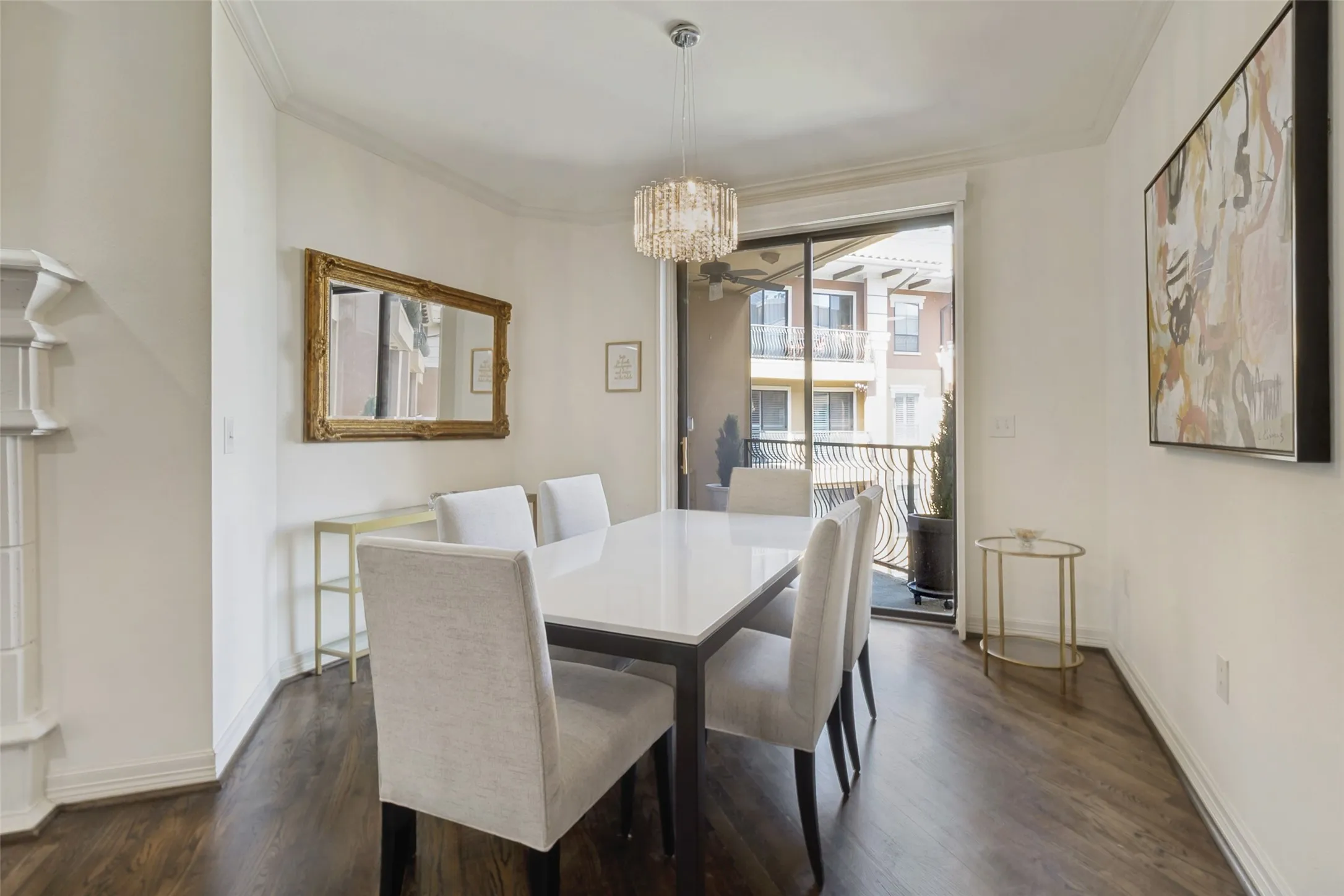 A view of the dining area looking out onto a second balcony