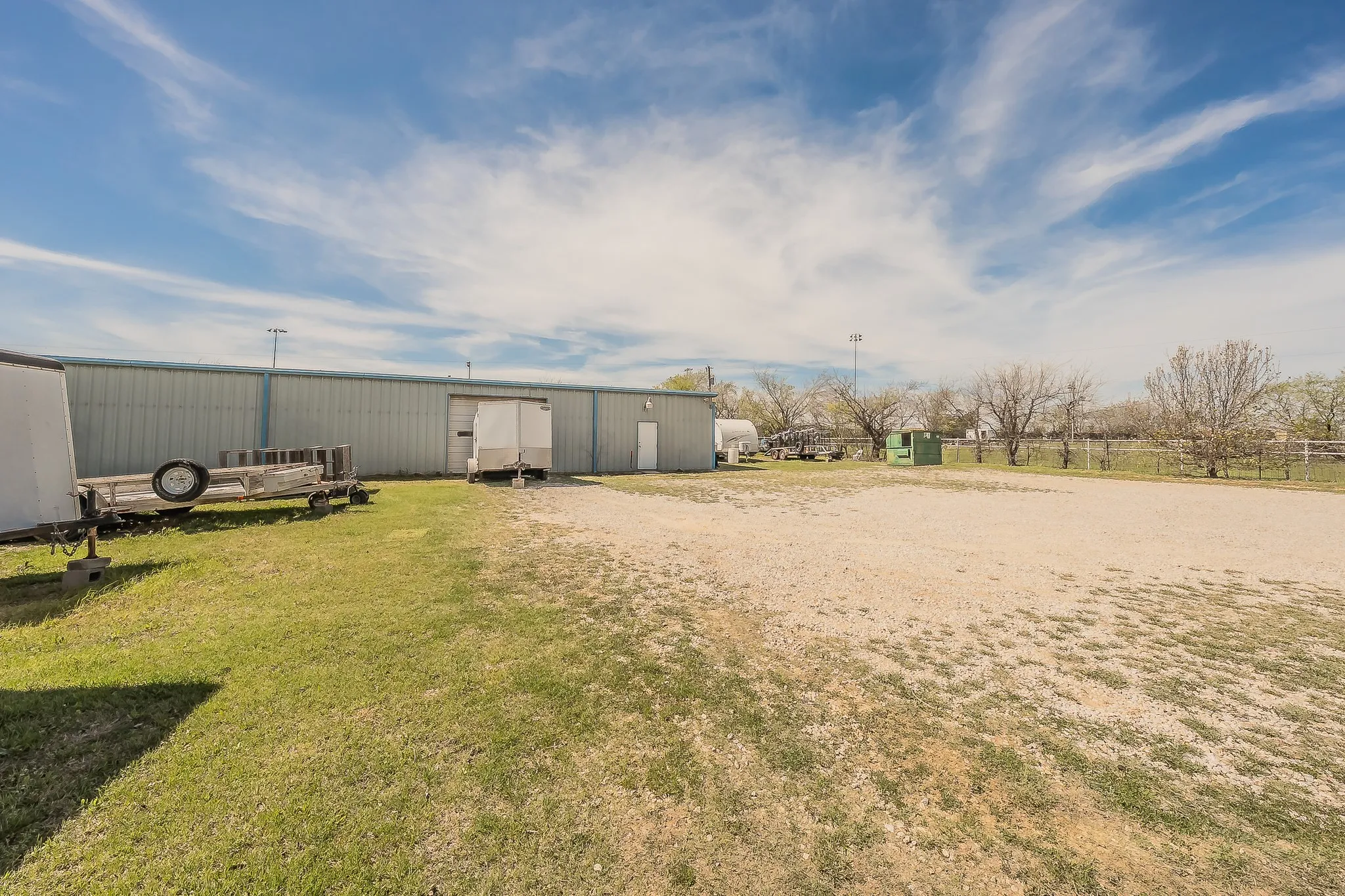 Back acres with building
