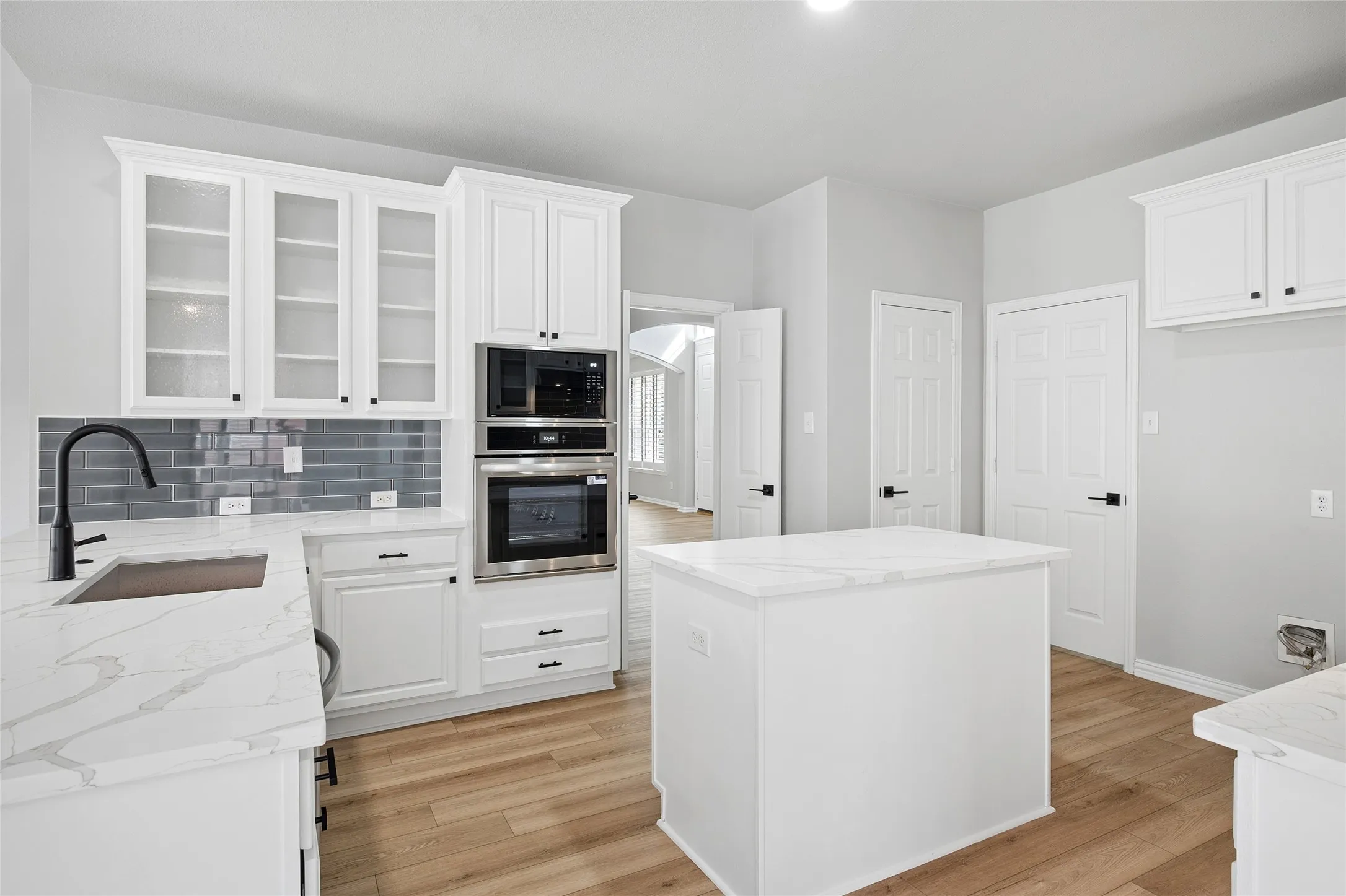Kitchen has all new stainless appliances and quartz counter tops.