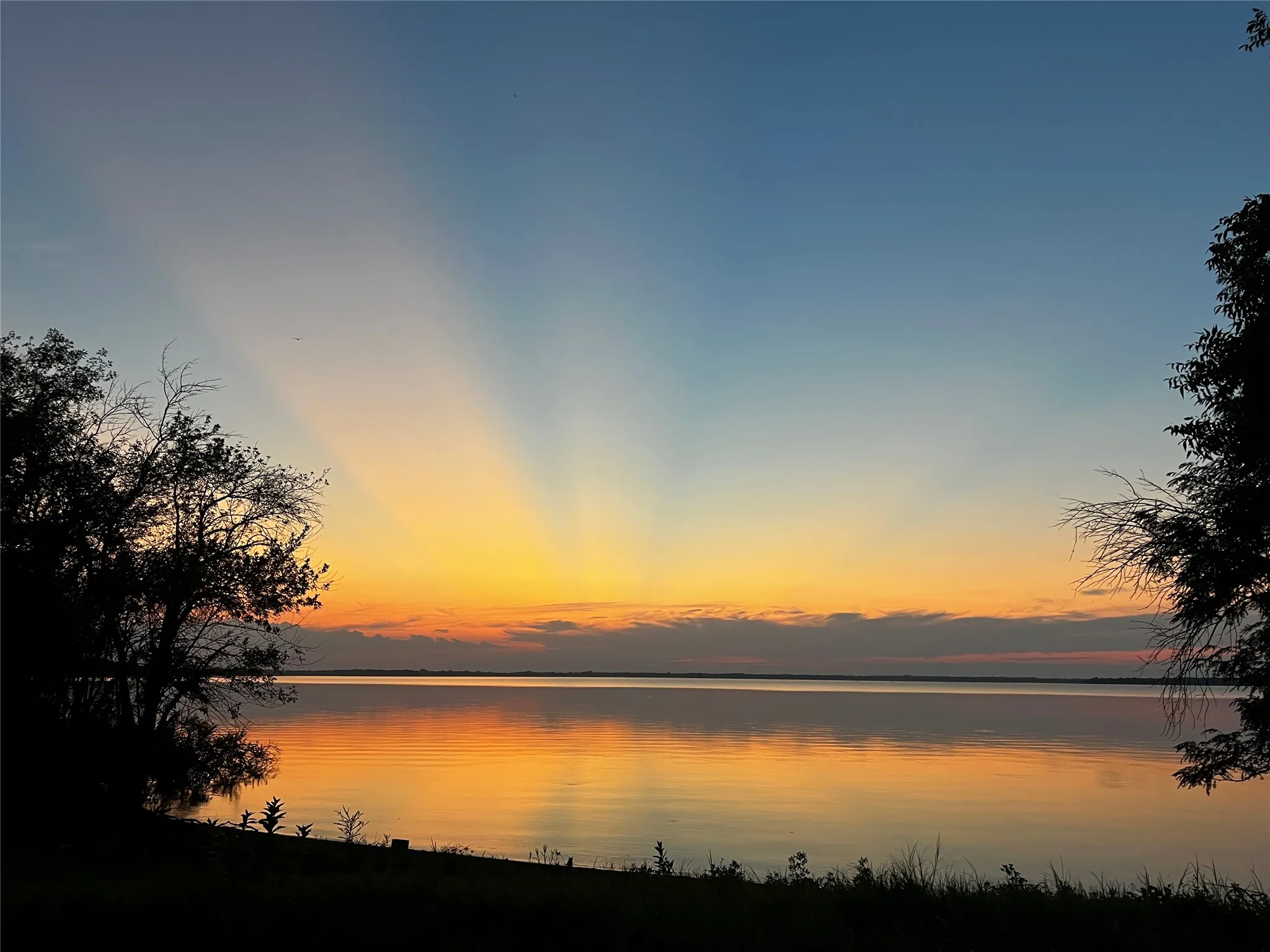 Sunset view from the lake access point just across the street