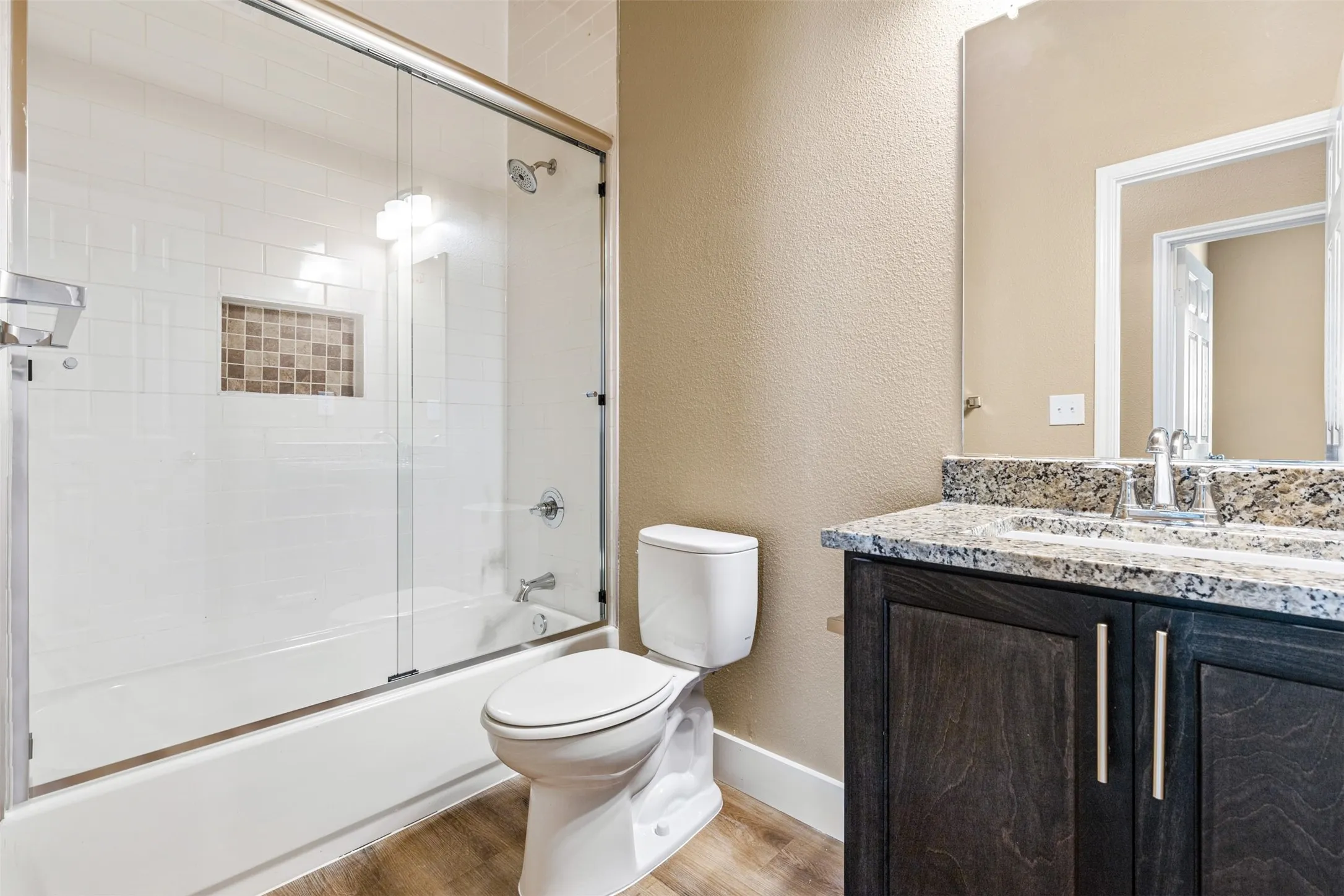 Hall full bath with granite