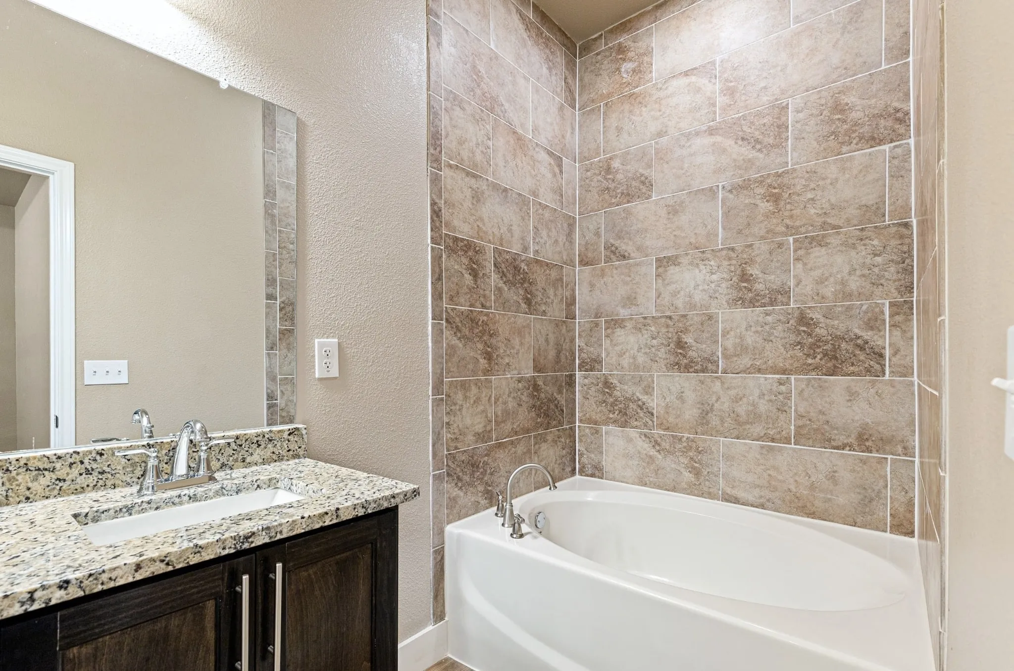Garden tub in primary plus spa shower