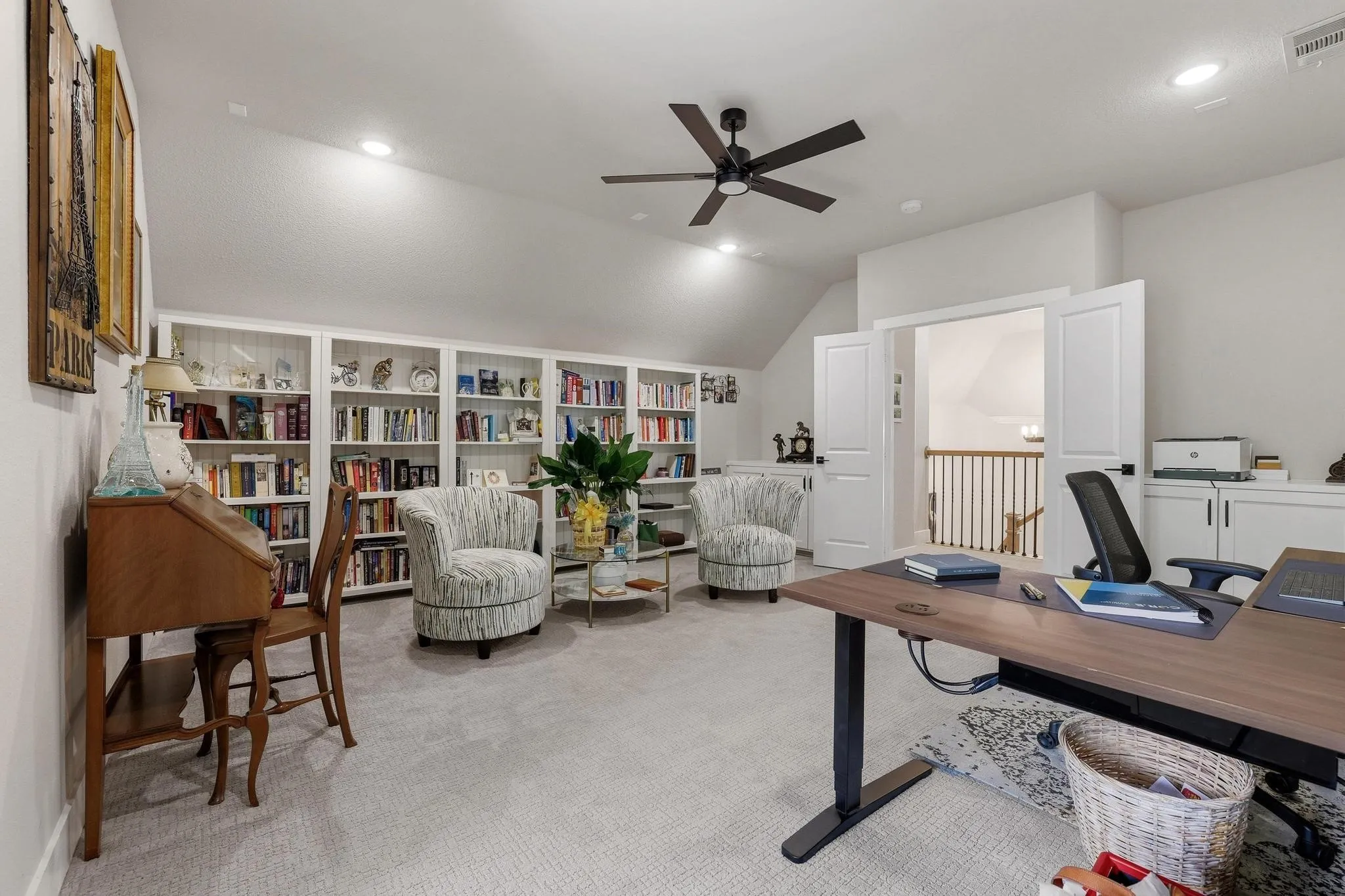 Office with a ceiling fan, vaulted ceiling, light colored carpet, and recessed lighting