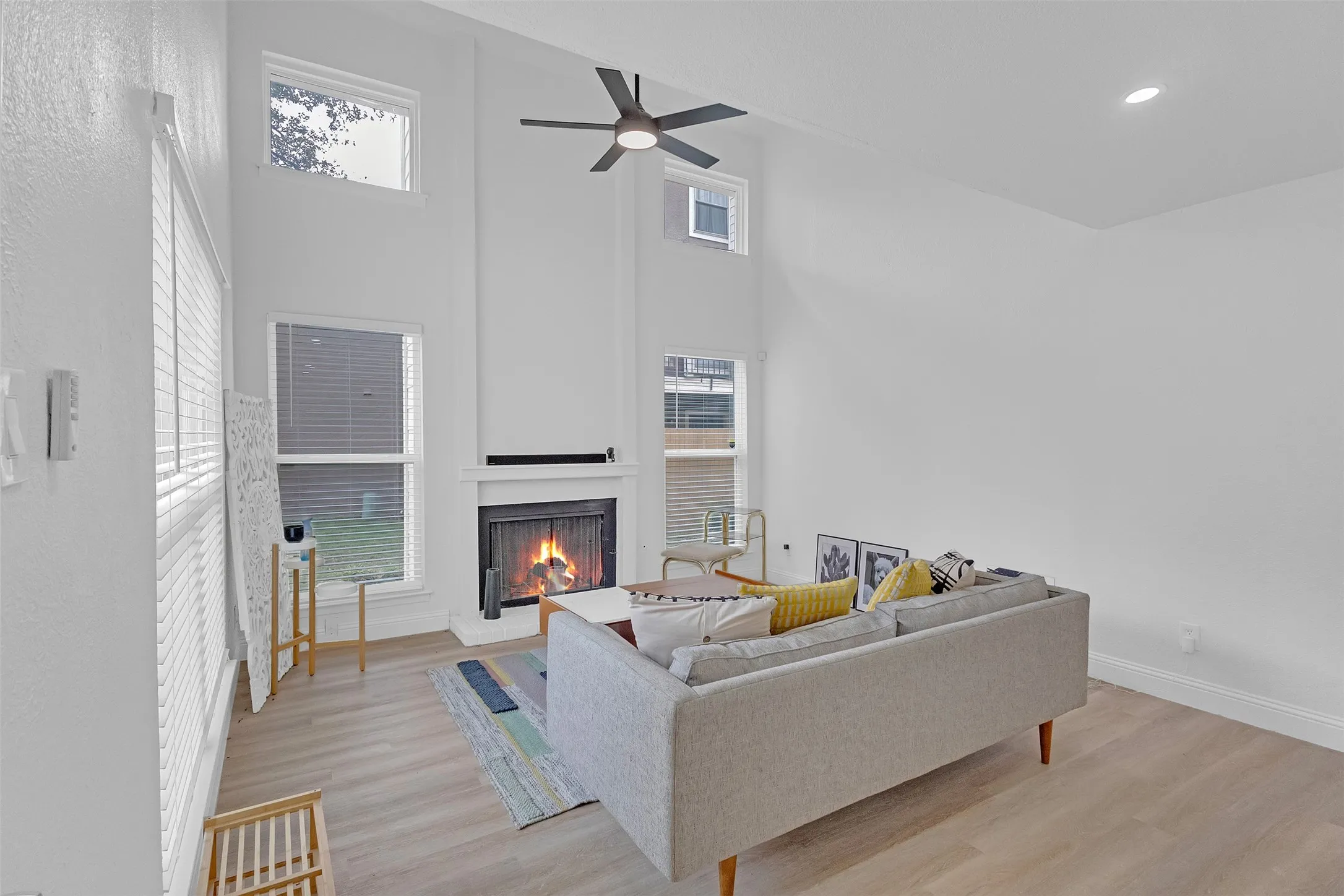  LIVING ROOM WITH WOOD BURNING-FIREPLACE