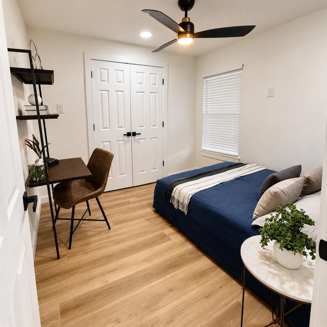 Recessed ceiling lighting, wood-finish flooring, white paneled bifold closet doors, a ceiling fan with light, and a window with blinds