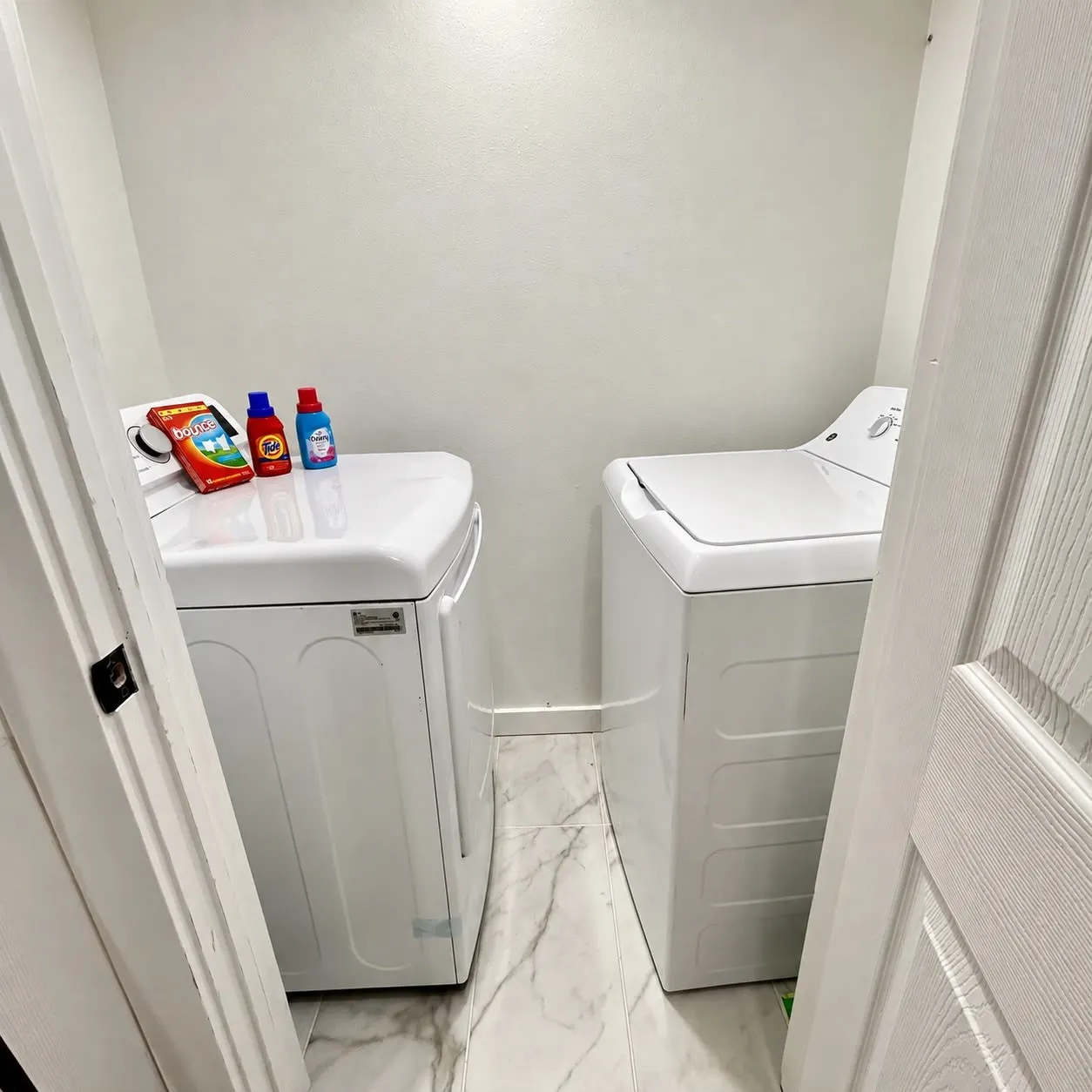 White laundry appliances with a side-by-side configuration