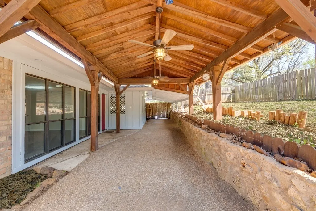 View of patio with a ceiling fan