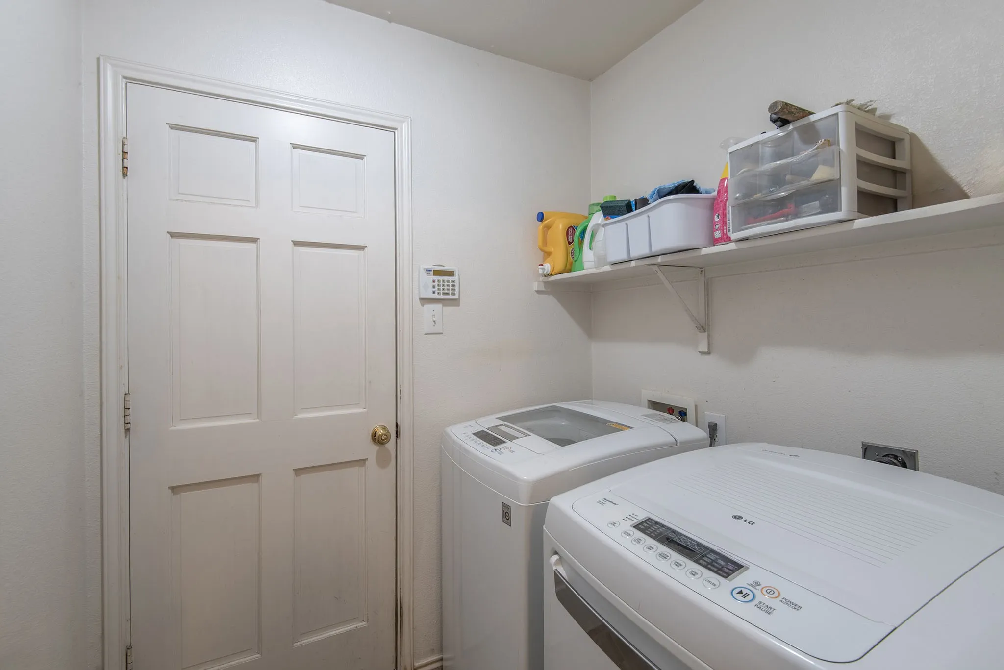 Laundry room with independent washer and dryer