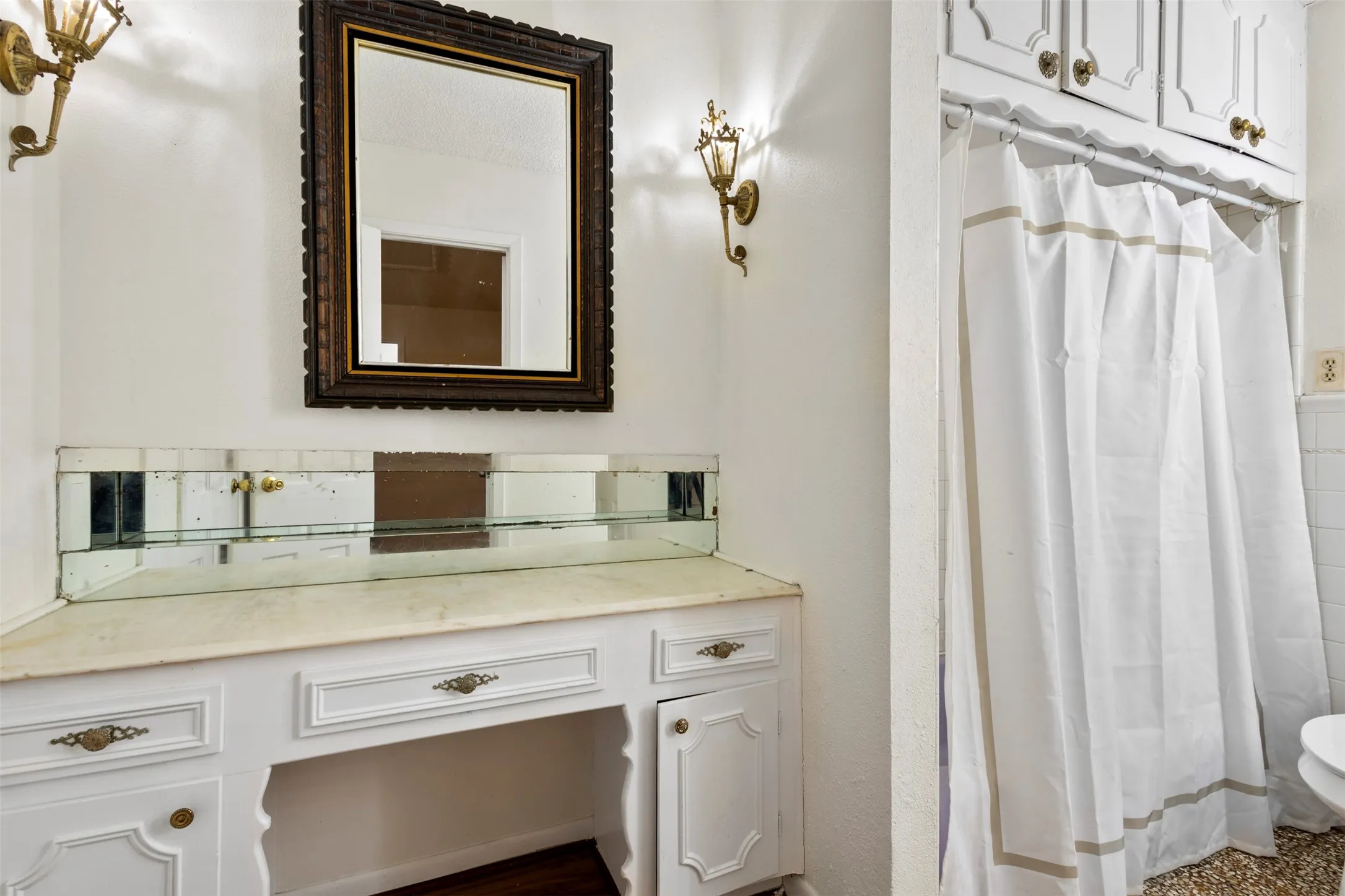 Bathroom with vanity and a shower with curtain