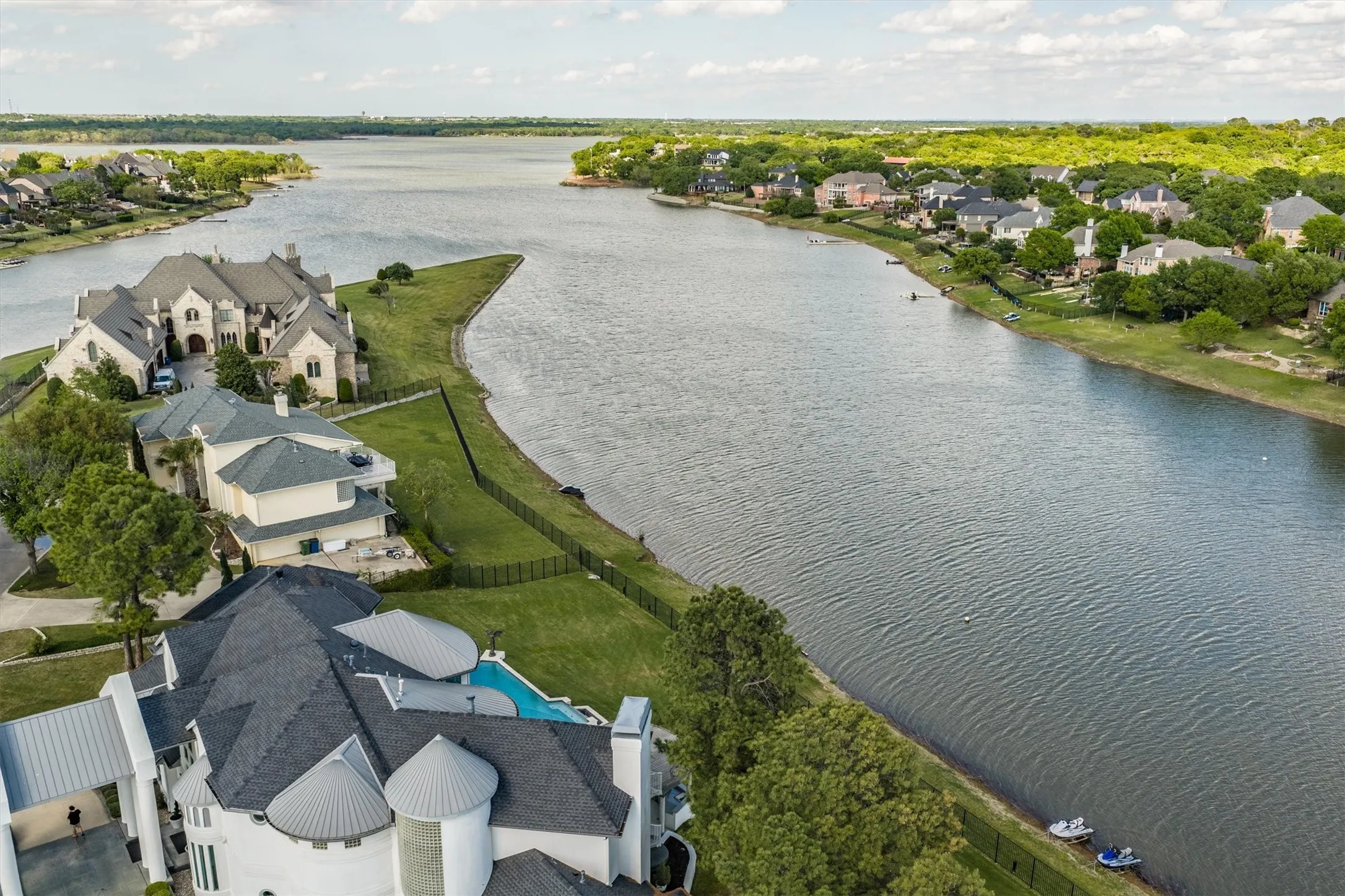 Along a quite cove with exceptional lake frontage are breathtaking views of the lake.