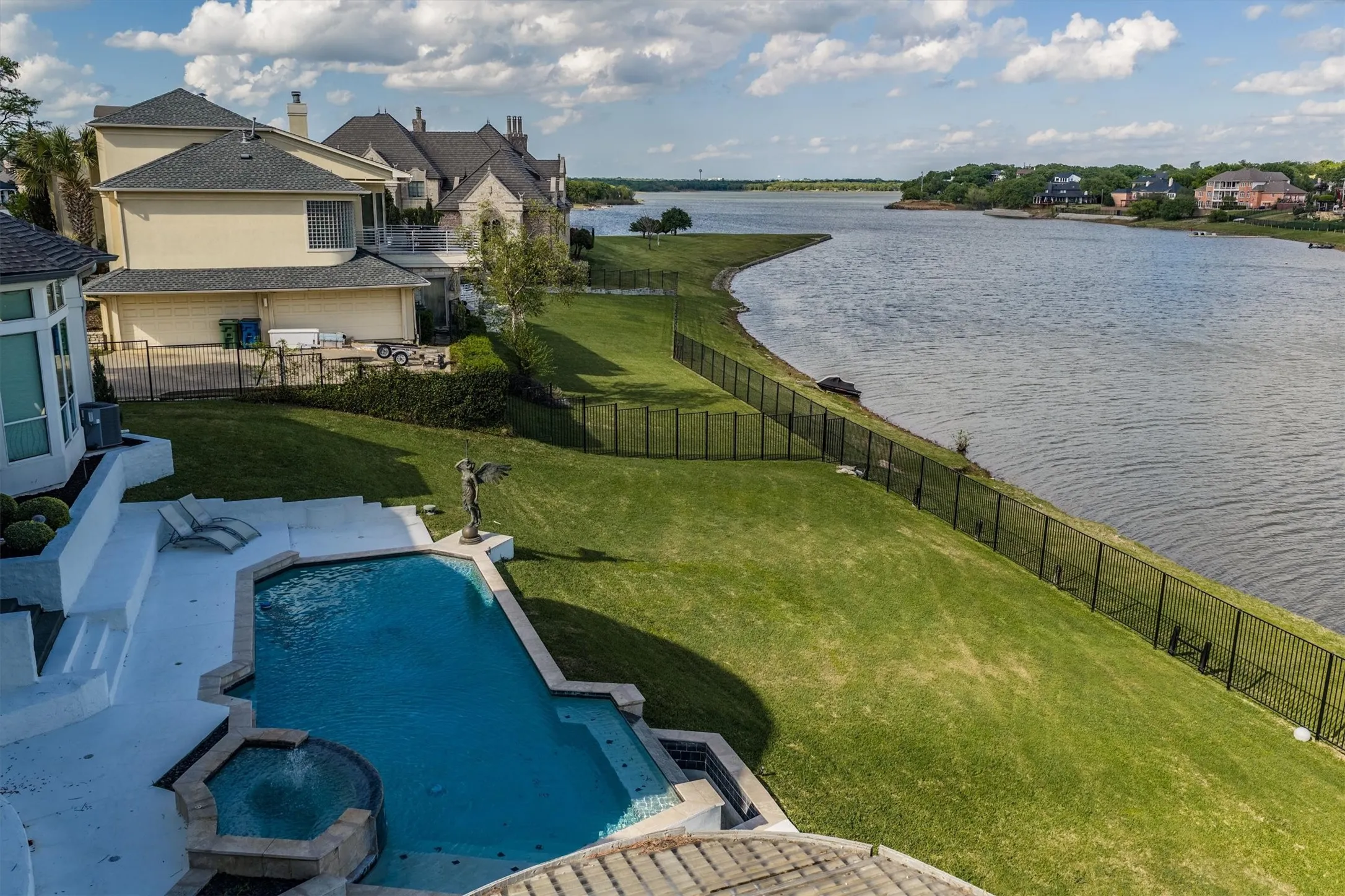The pool enjoys ideal afternoon shade, thanks to the home's orientation, creating a comfortable retreat even on warm summer days!