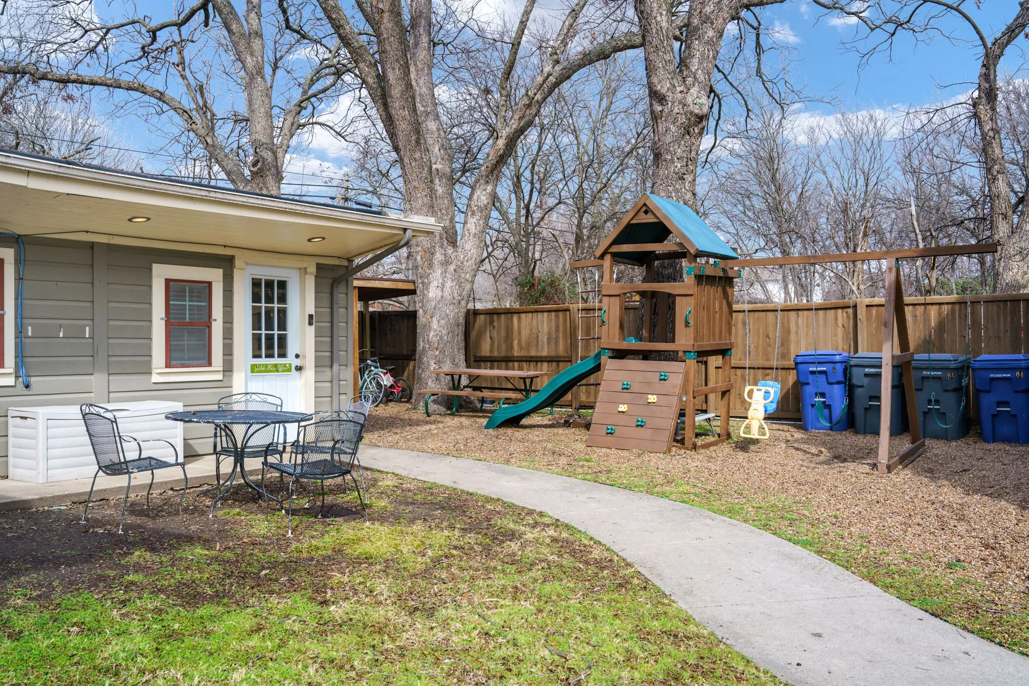 Shared green space connecting all three properties, offering an opportunity to enhance guest experience with outdoor seating, entertainment areas, or communal gathering space.