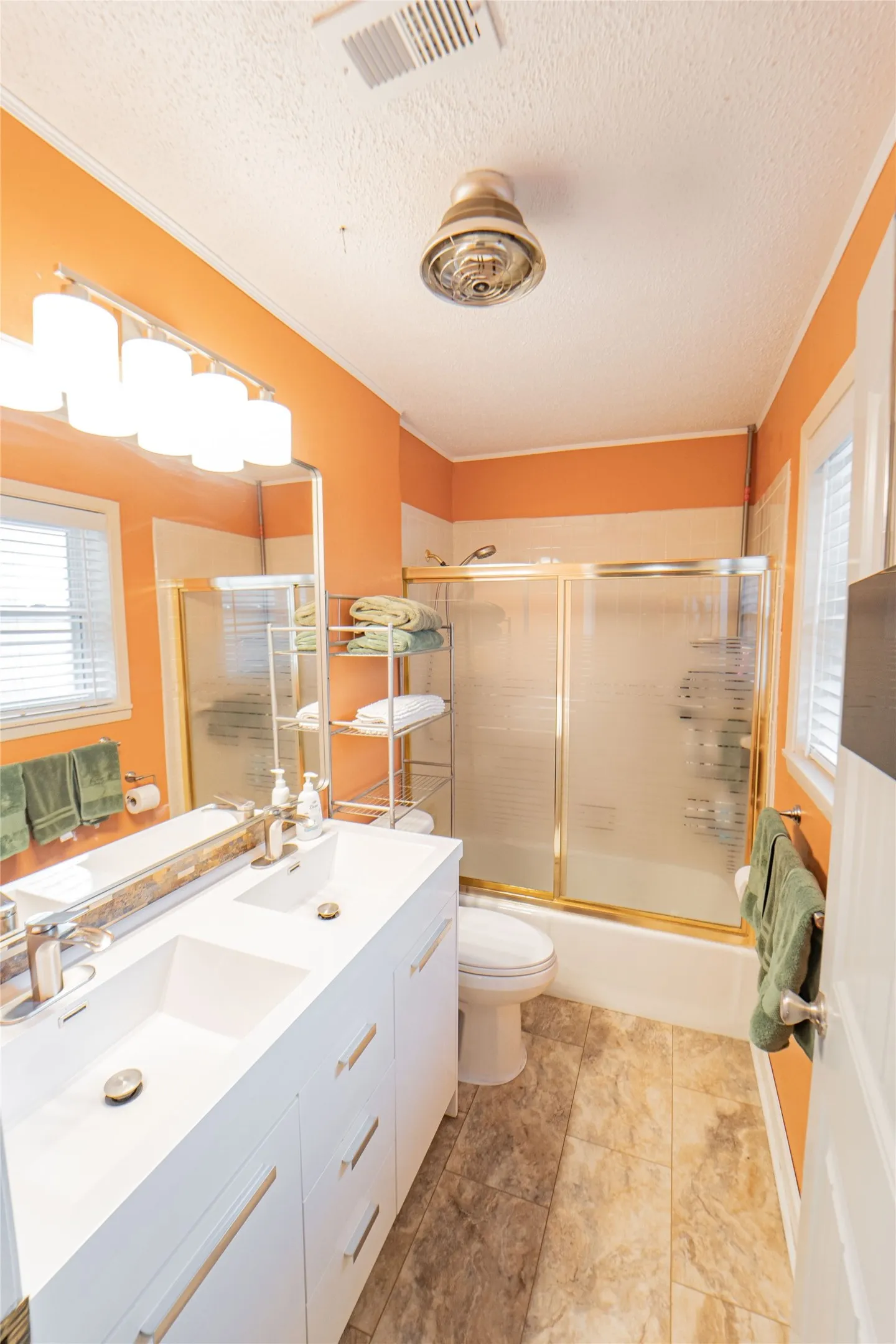 Full bathroom featuring double vanity