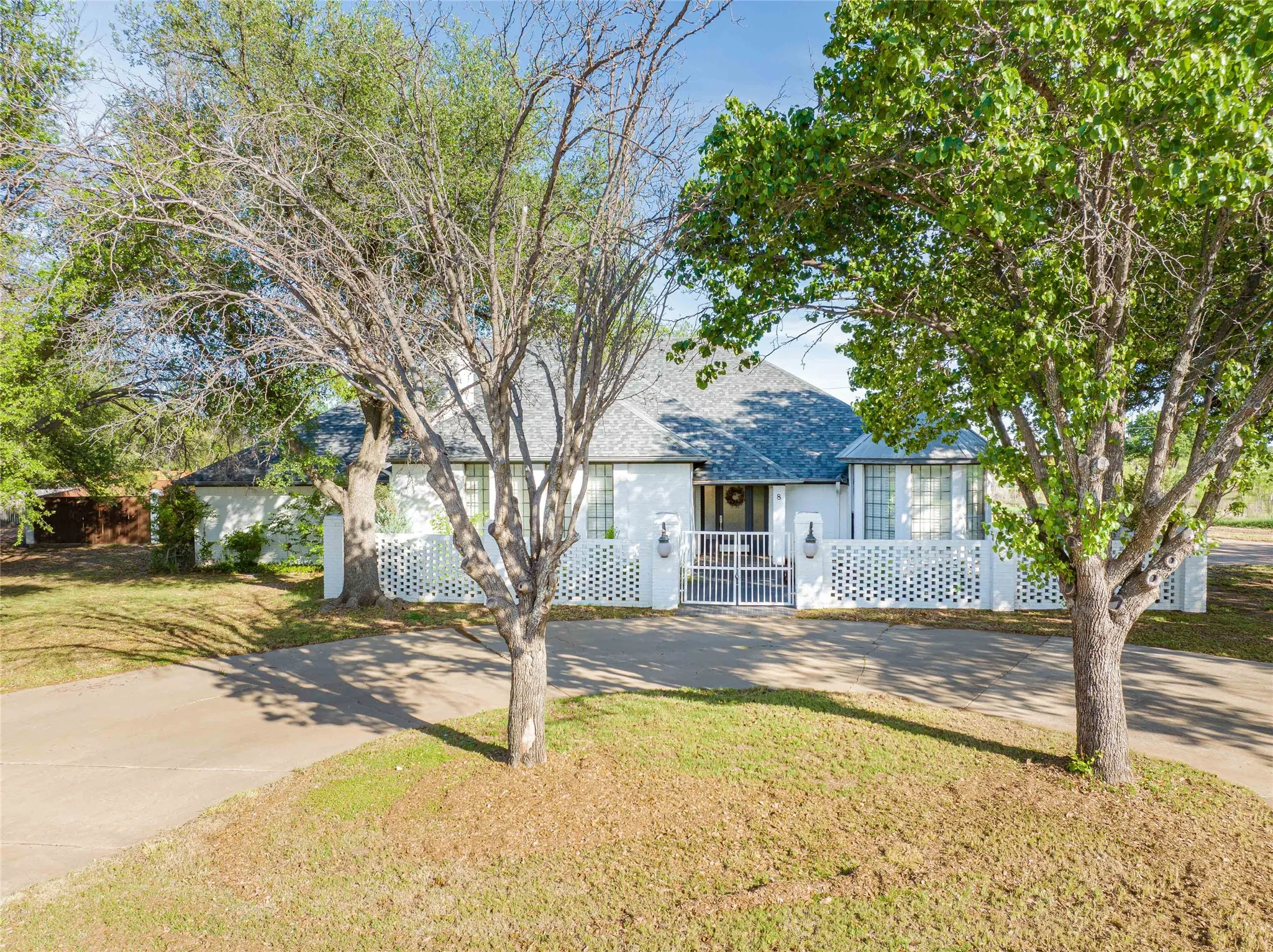 View of front of house featuring a fenced front yard