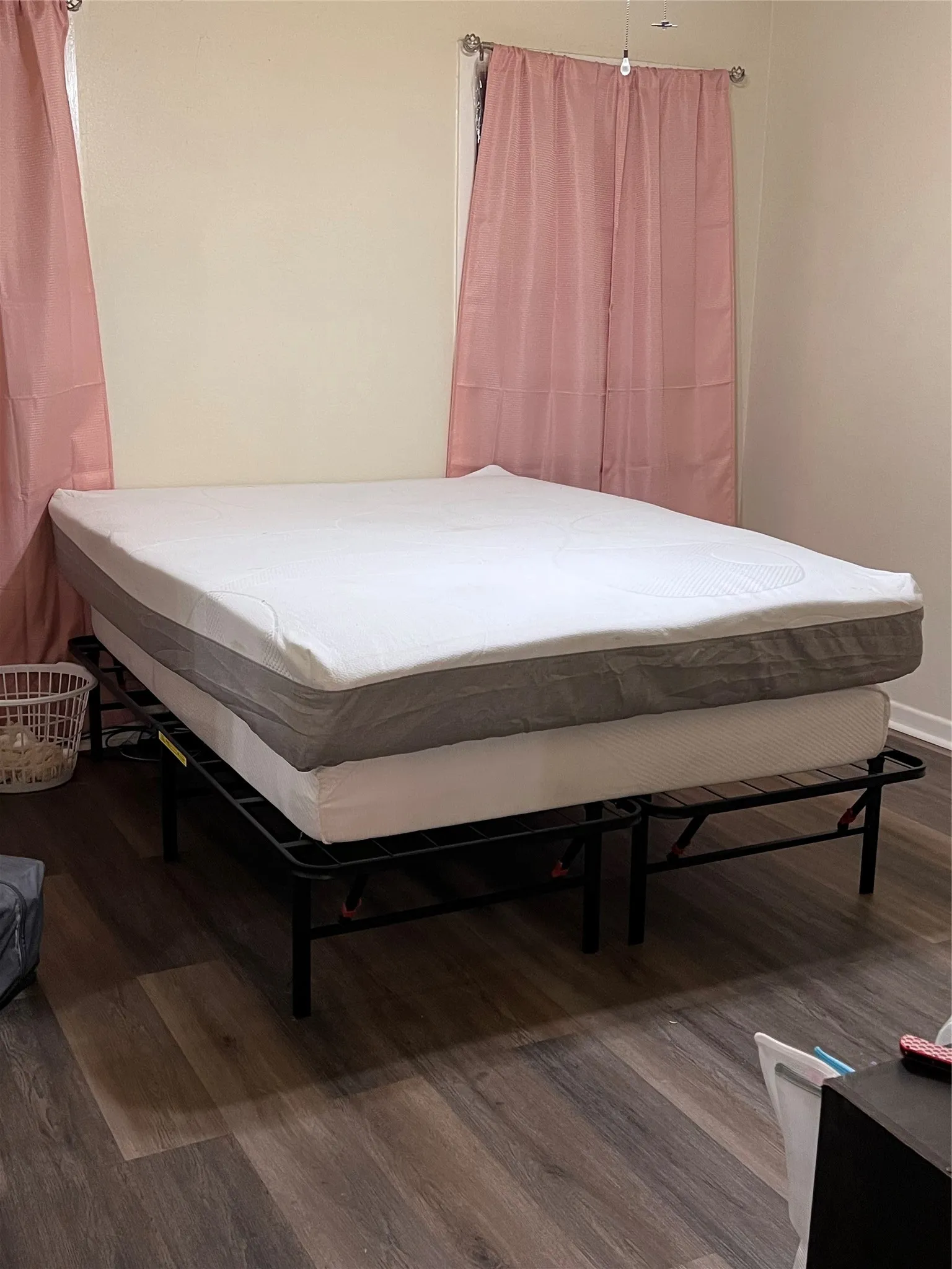 Bedroom featuring dark wood finished floors