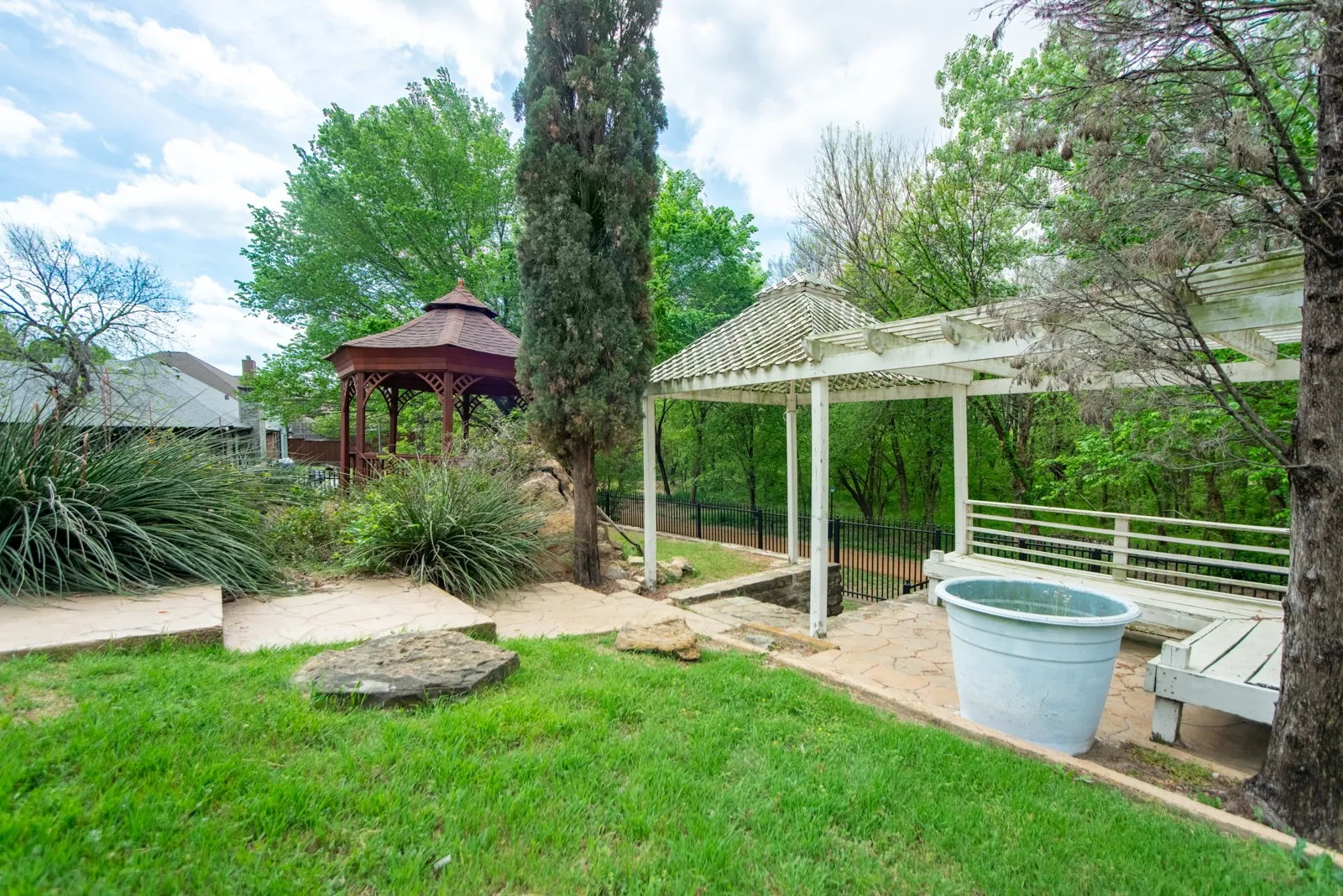View of yard with a patio area, a gazebo, and a pergola