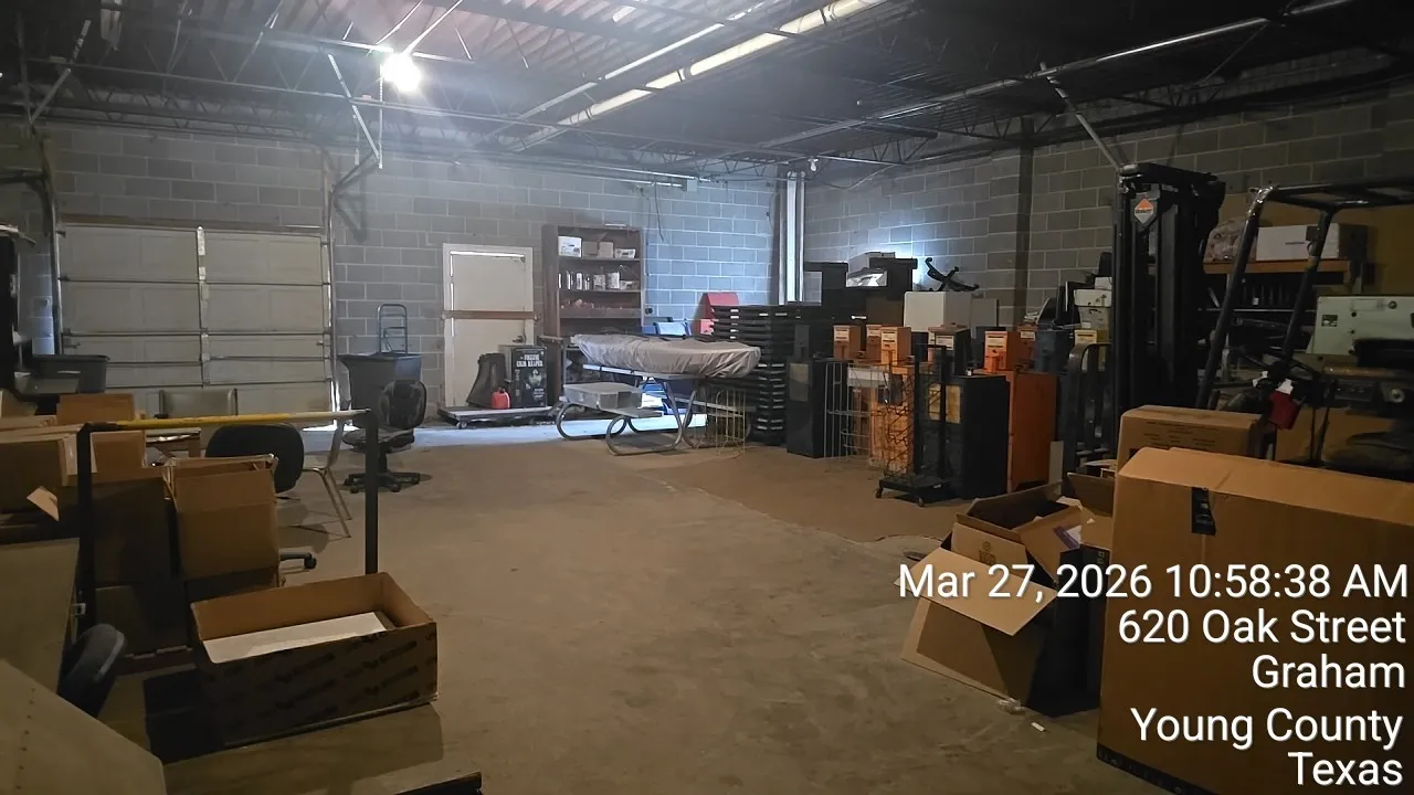 Back room with garage door opening and back door