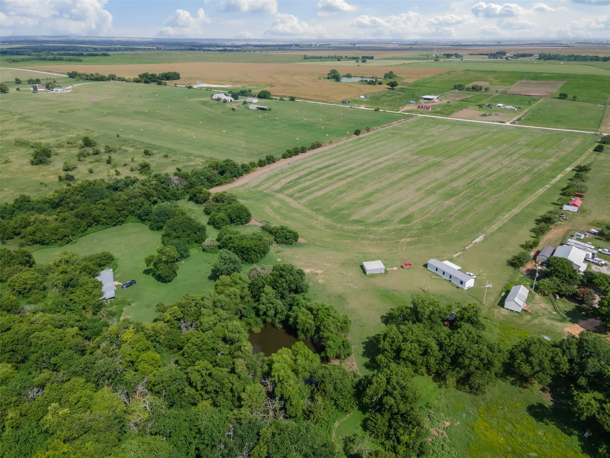 Aerial view of property's location featuring rural landscape