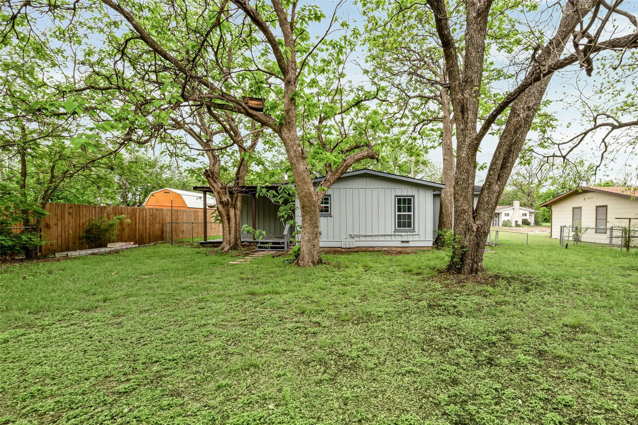 View of house from corner of yard.
