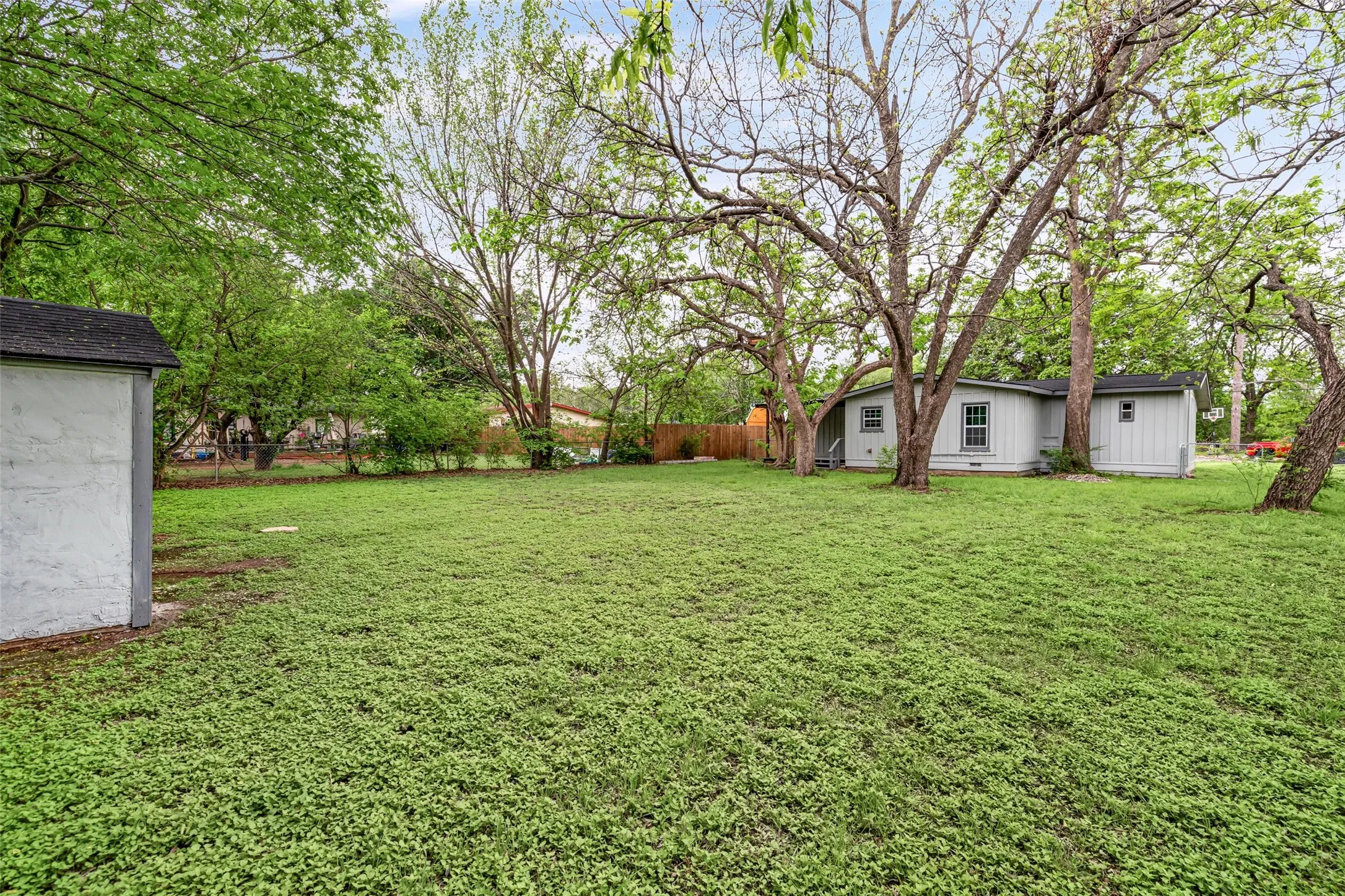 View of yard from the back fence.