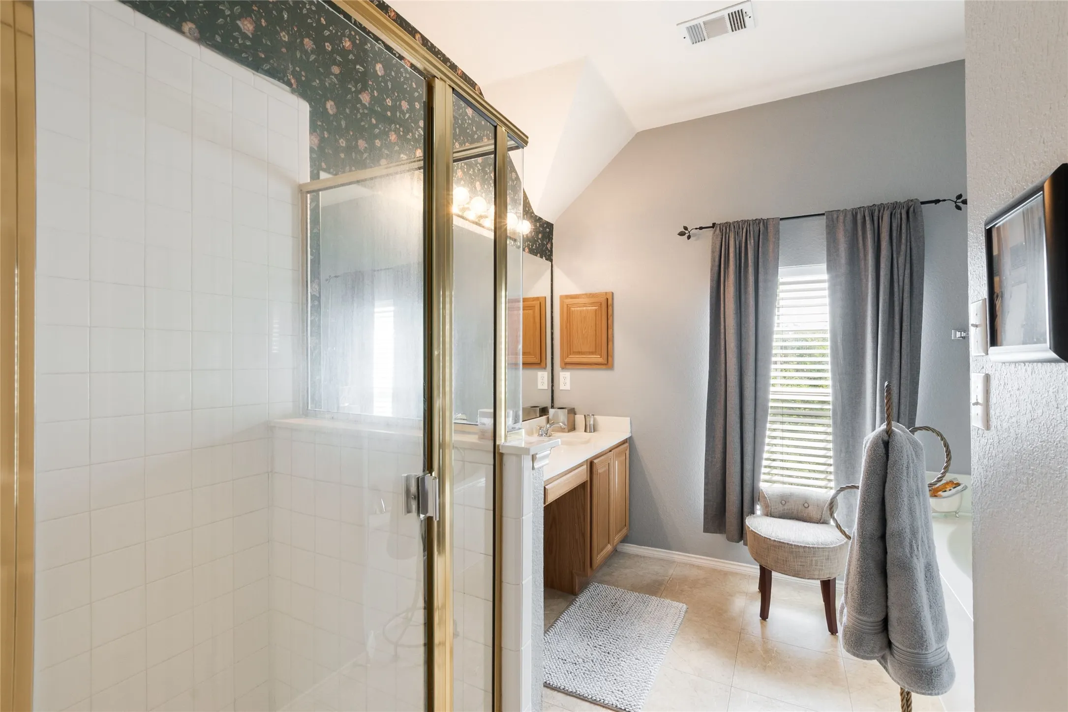 Separate shower and large vanity area