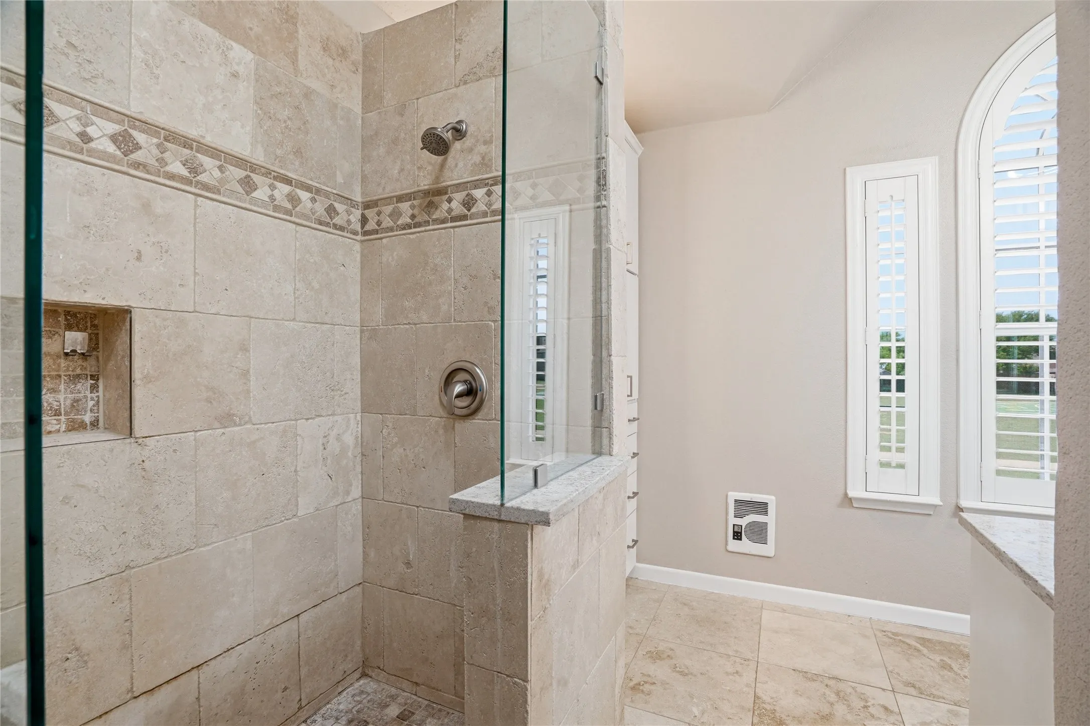 Full bath with walk in shower and heating unit