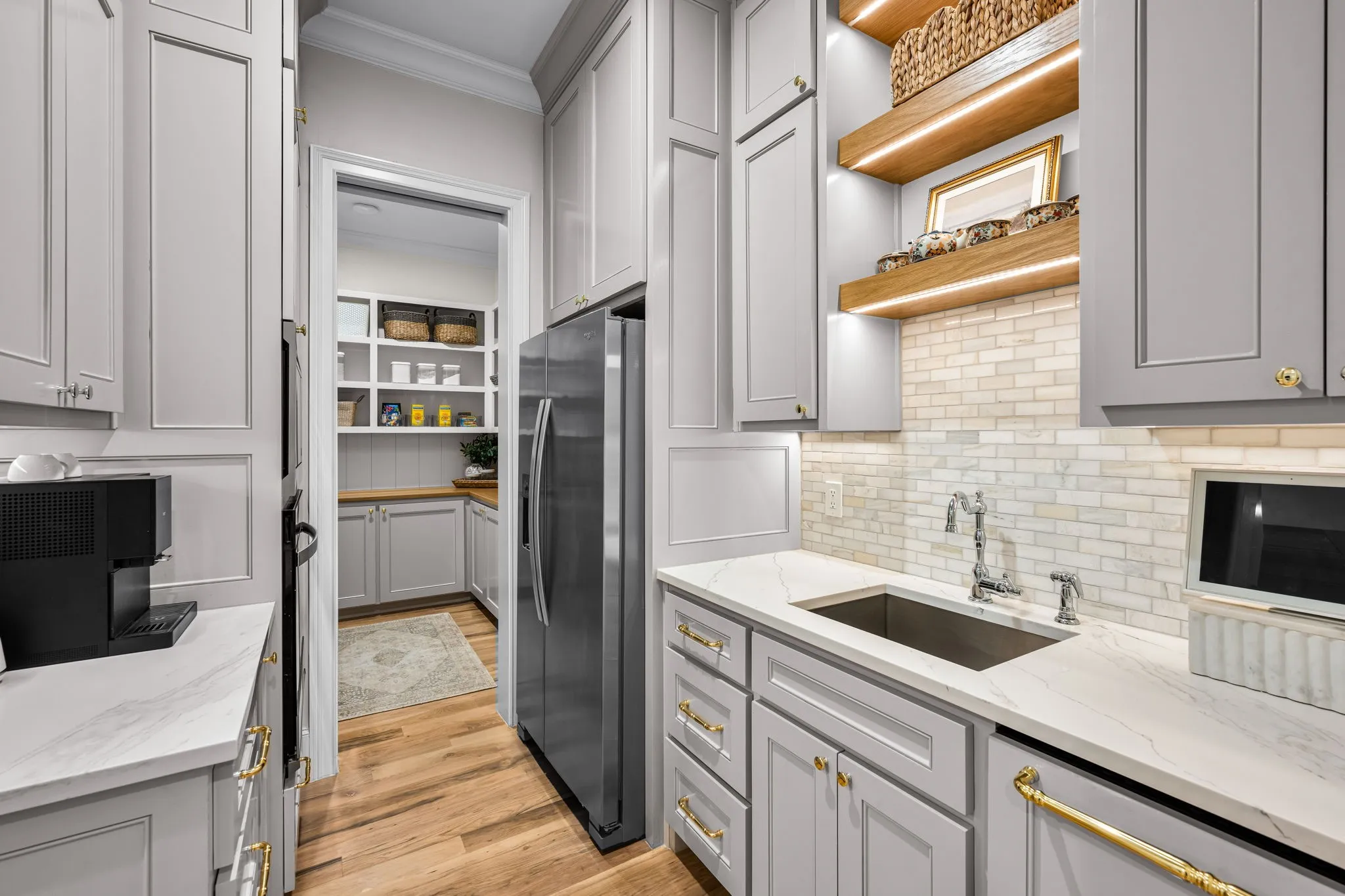 Prep Kitchen just steps from the kitchen. Cabinets are SW Colonnade grey