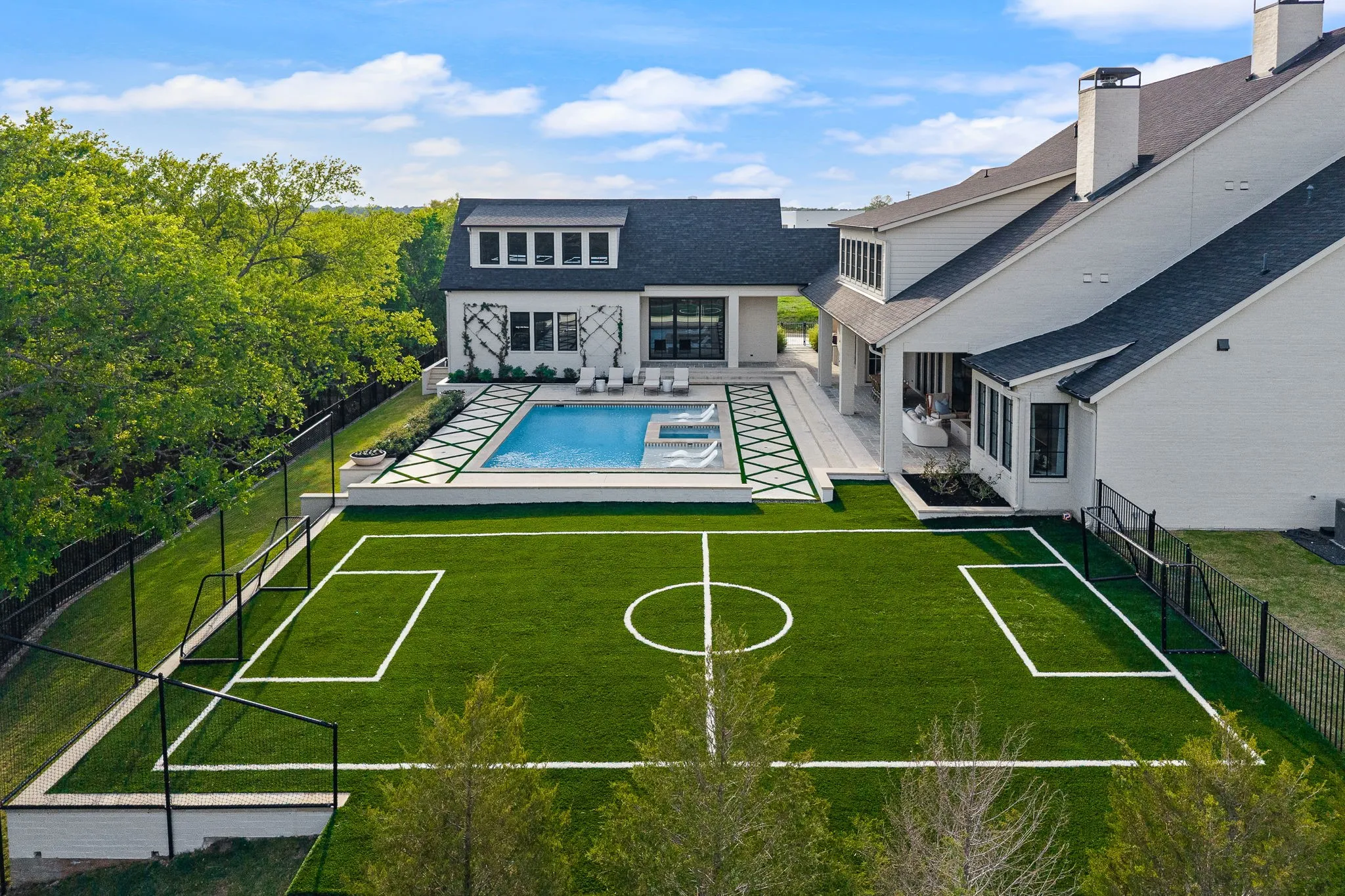 Come play soccer with the kids or enjoy a dip in the pool! Imagine this soccer field as a large multi-hole putting green or a pickleball court