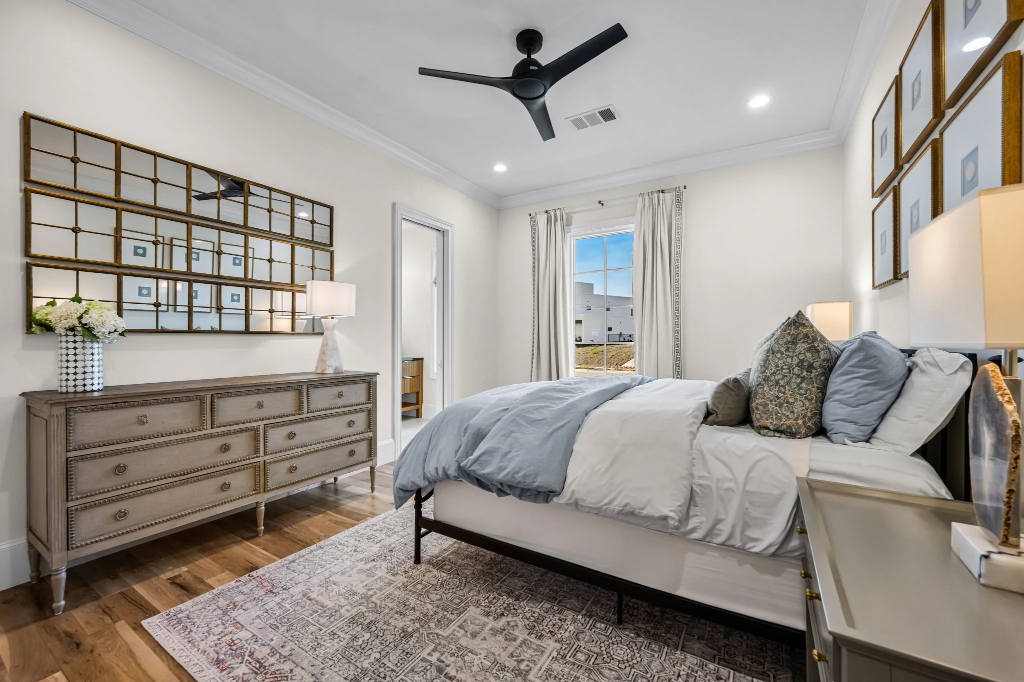 Secondary bedroom downstairs with ensuite bath and walk in closet
