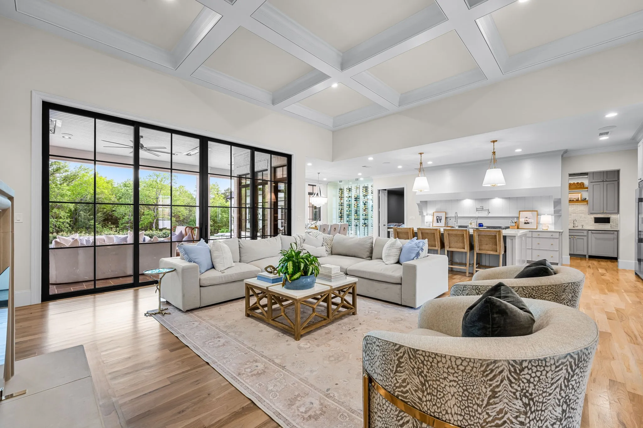 The craftsmanship is just next-level. It’s built with this deep, multi-dimensional grid of impeccably crisp beams that instantly draws your eye upward and makes the entire space feel impossibly grand and luxurious.