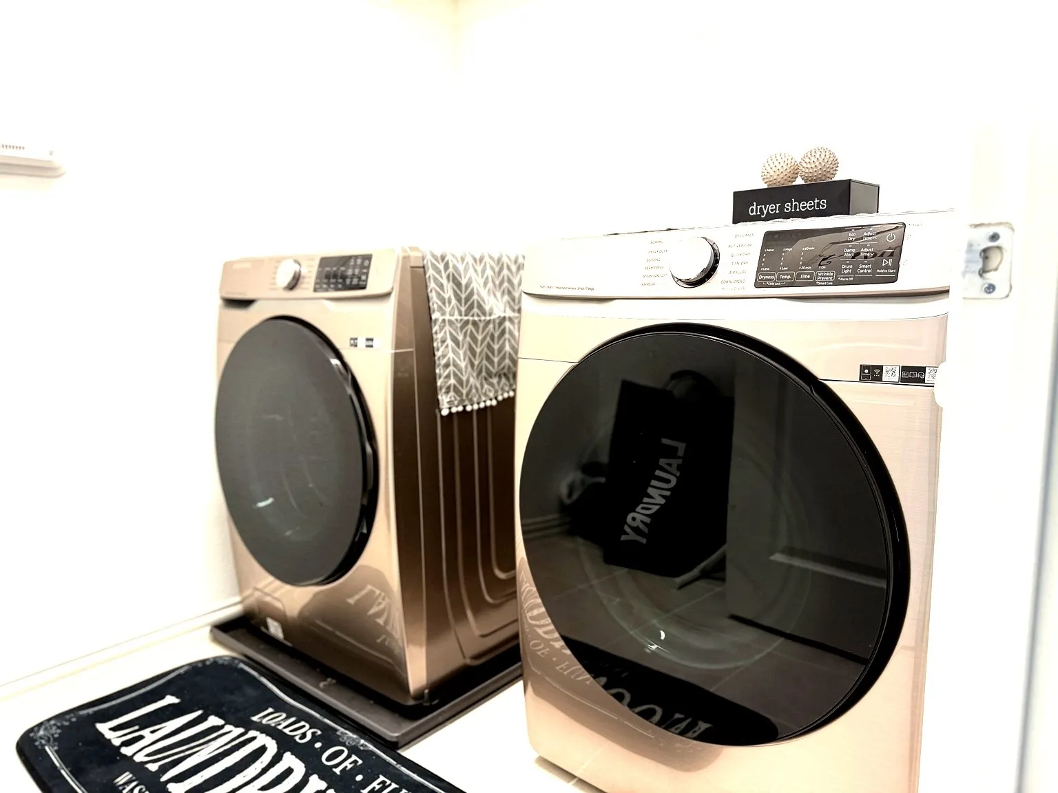 Laundry room with separate washer and dryer