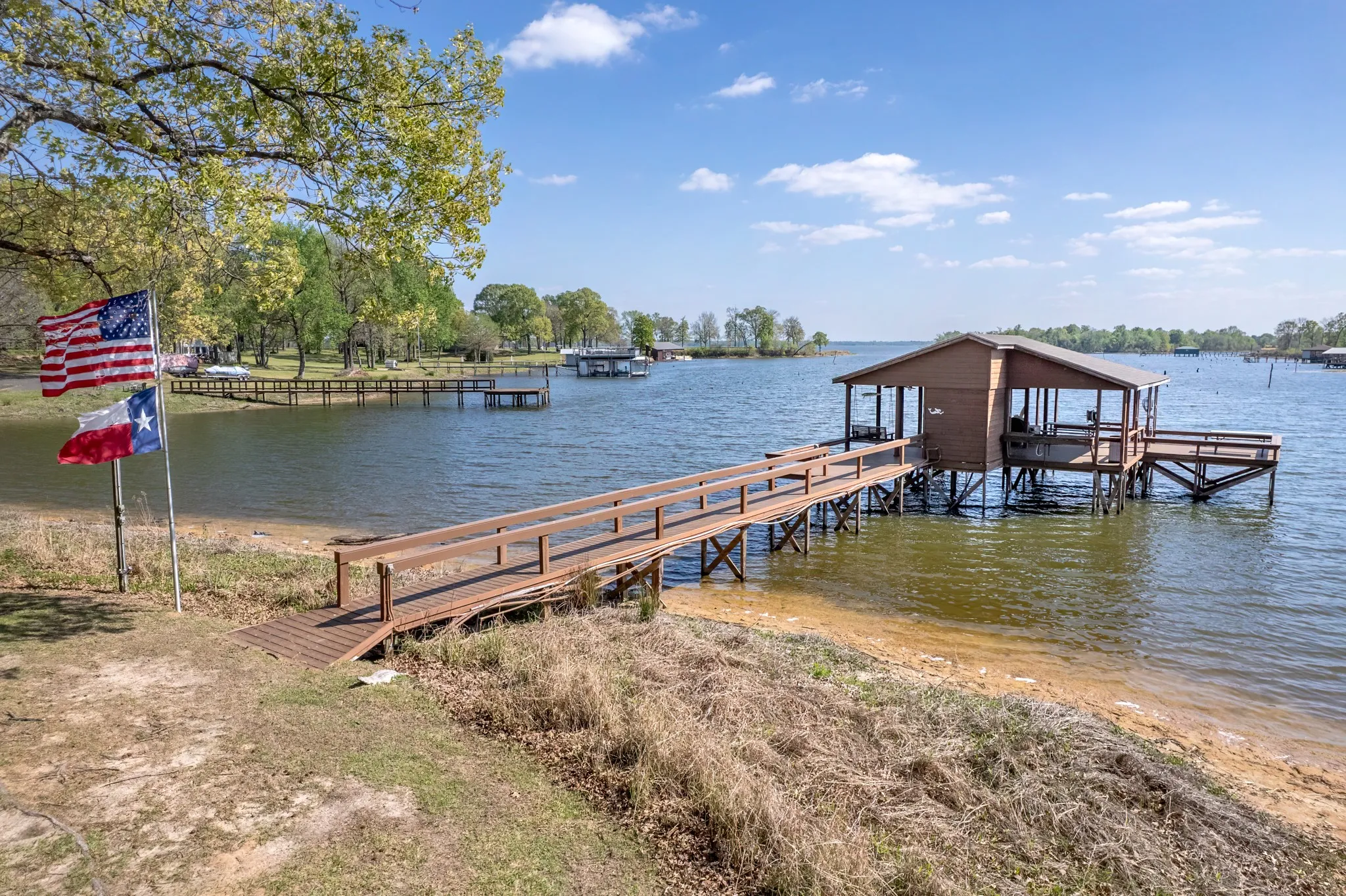 Dock with a water view and boat lift