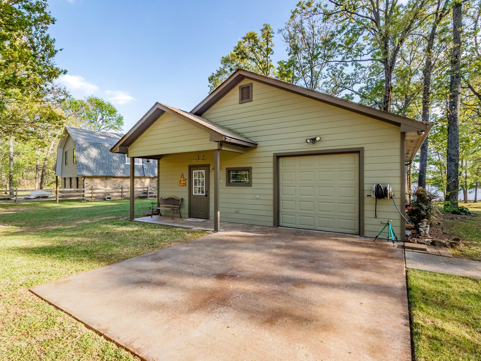 View of back if Guest Quarters with front and back porches.