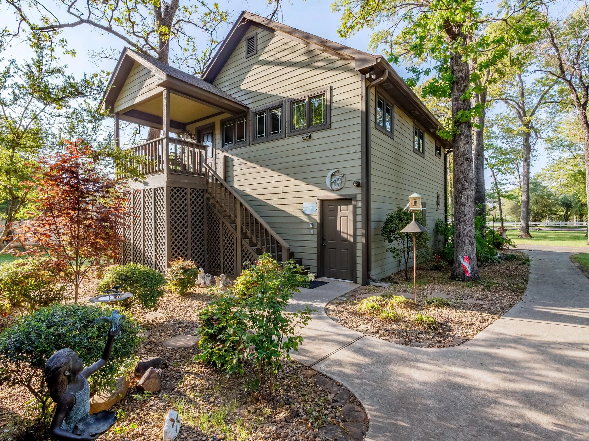 View of side of home with stairs