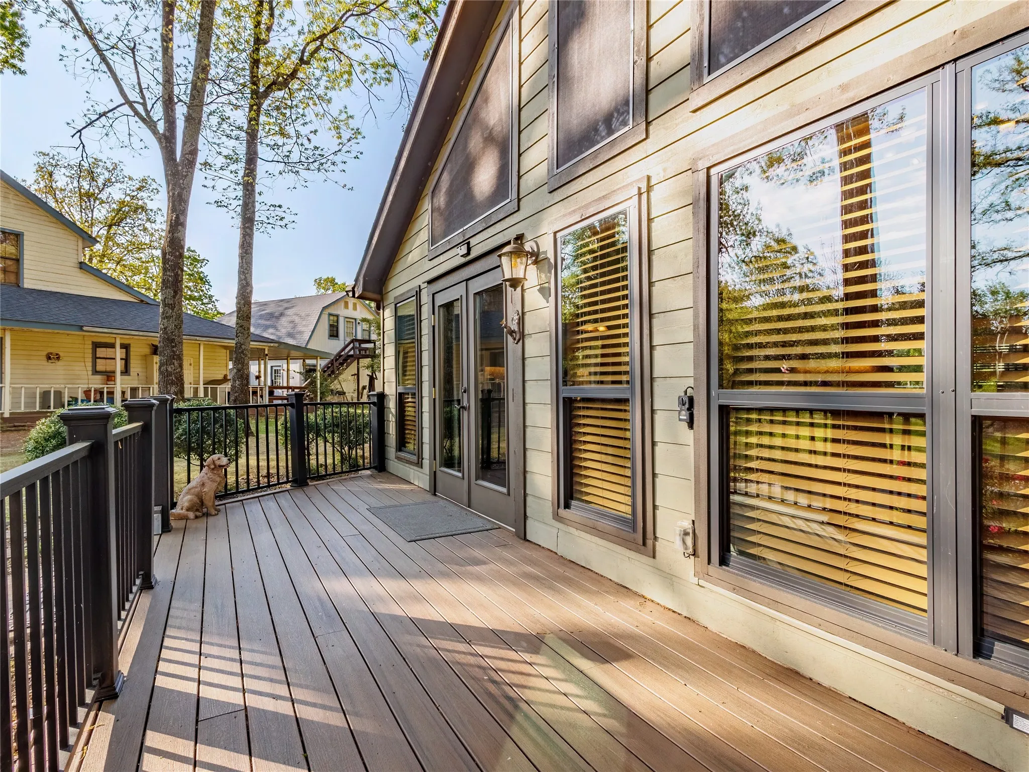 Wooden terrace featuring french doors