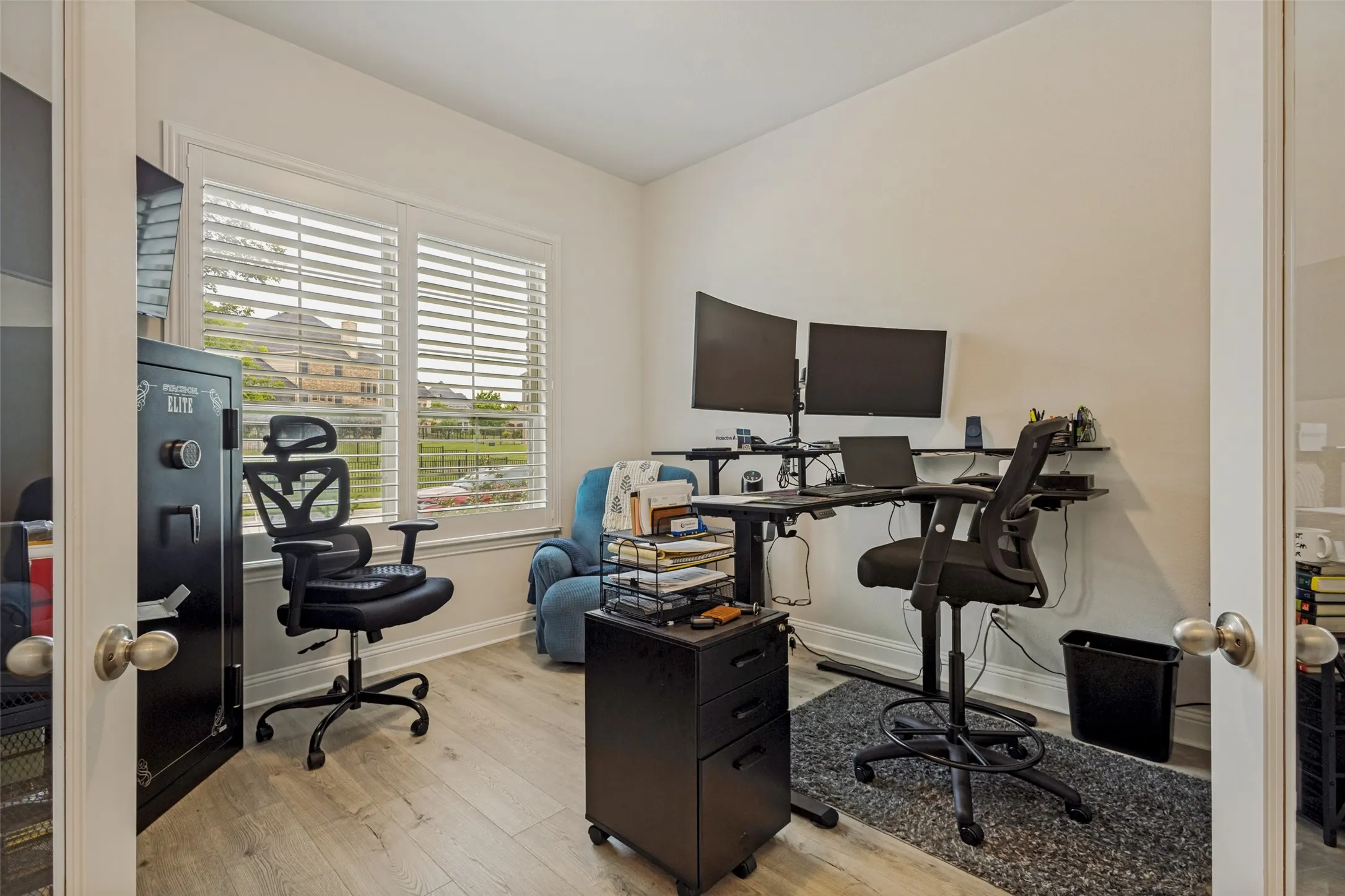 This room features light-colored flooring and white walls, creating a bright and airy atmosphere
