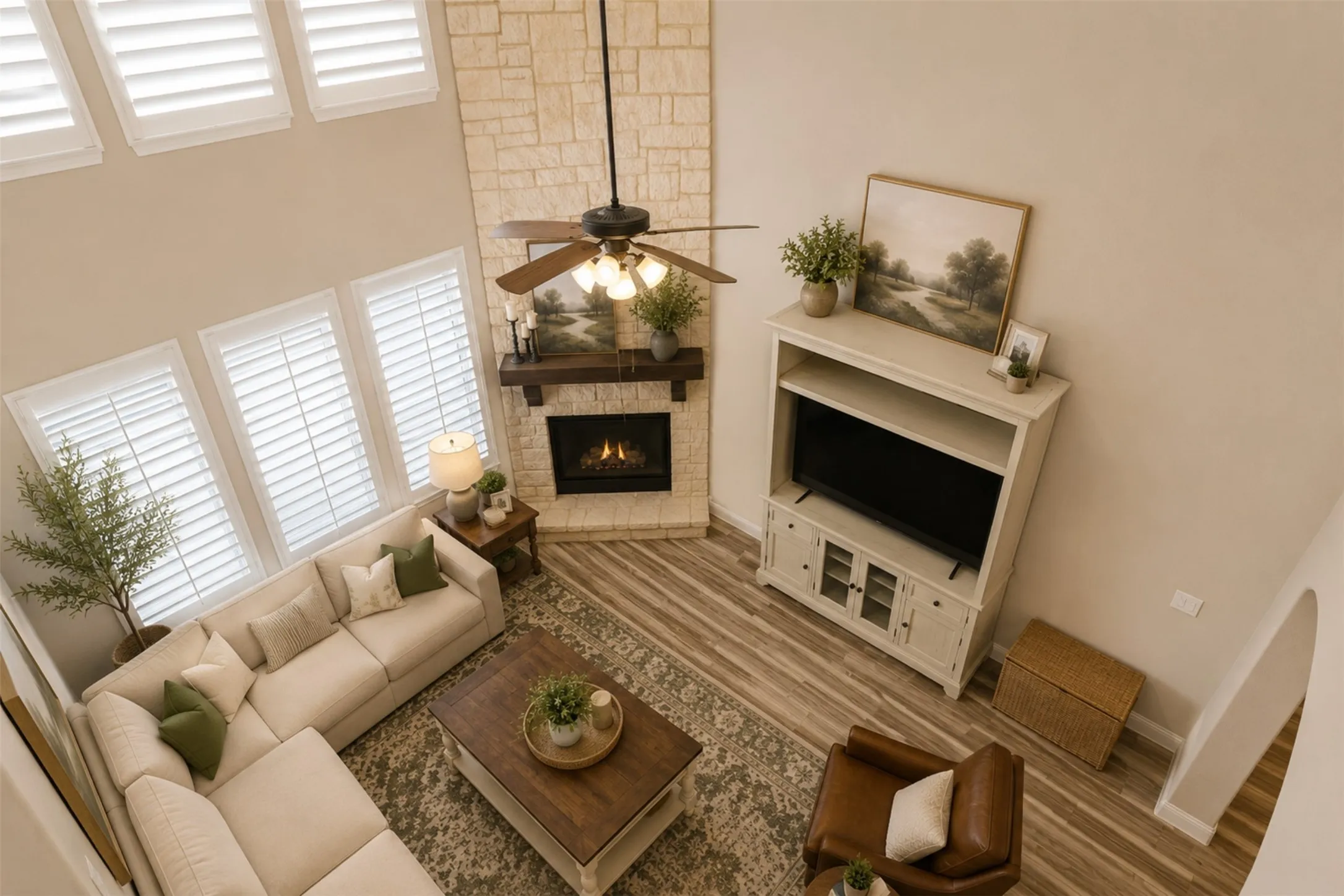 Virtually staged view of living area from the upstairs living