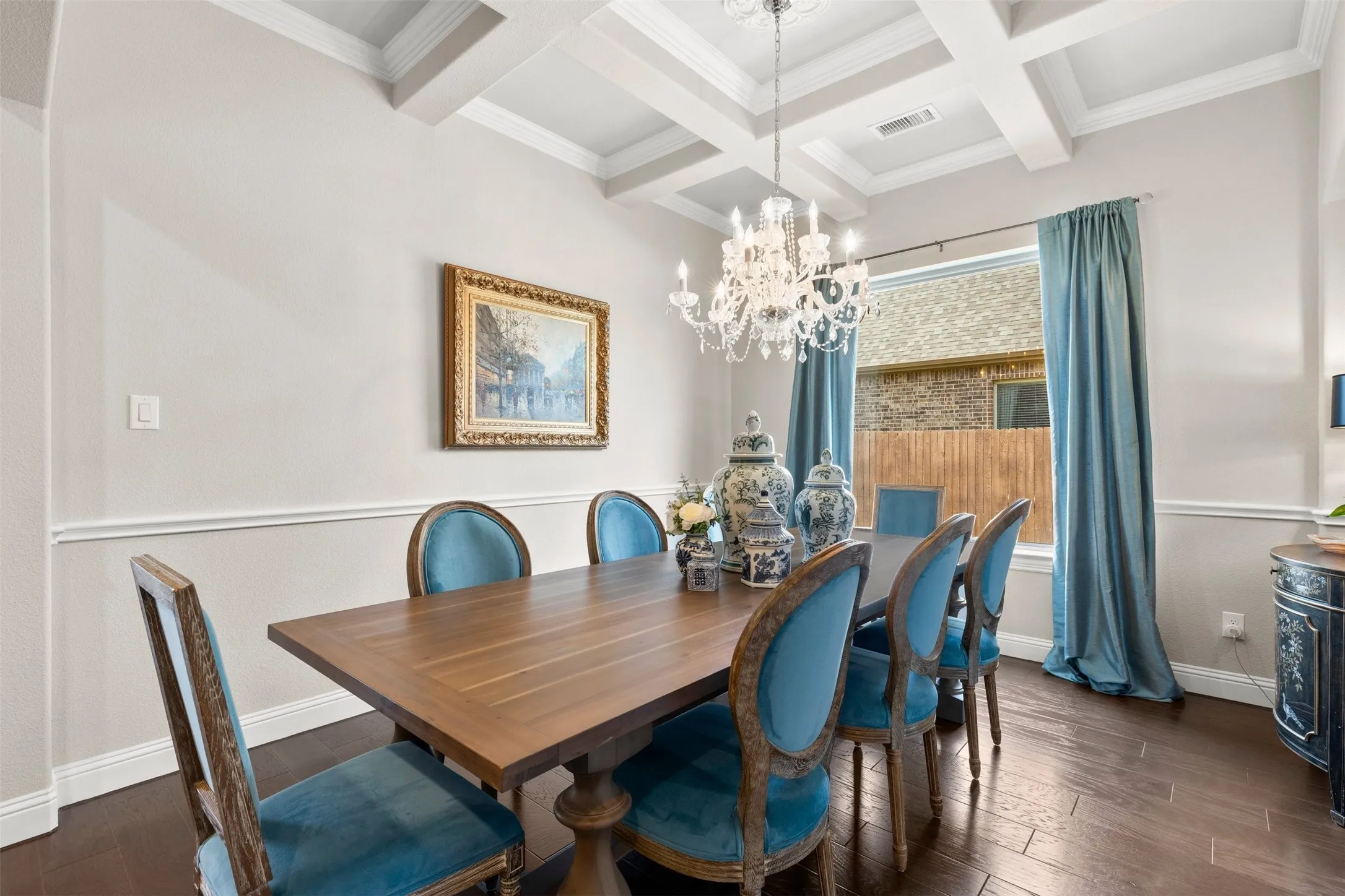 Elegant coffered ceiling and chandelier
