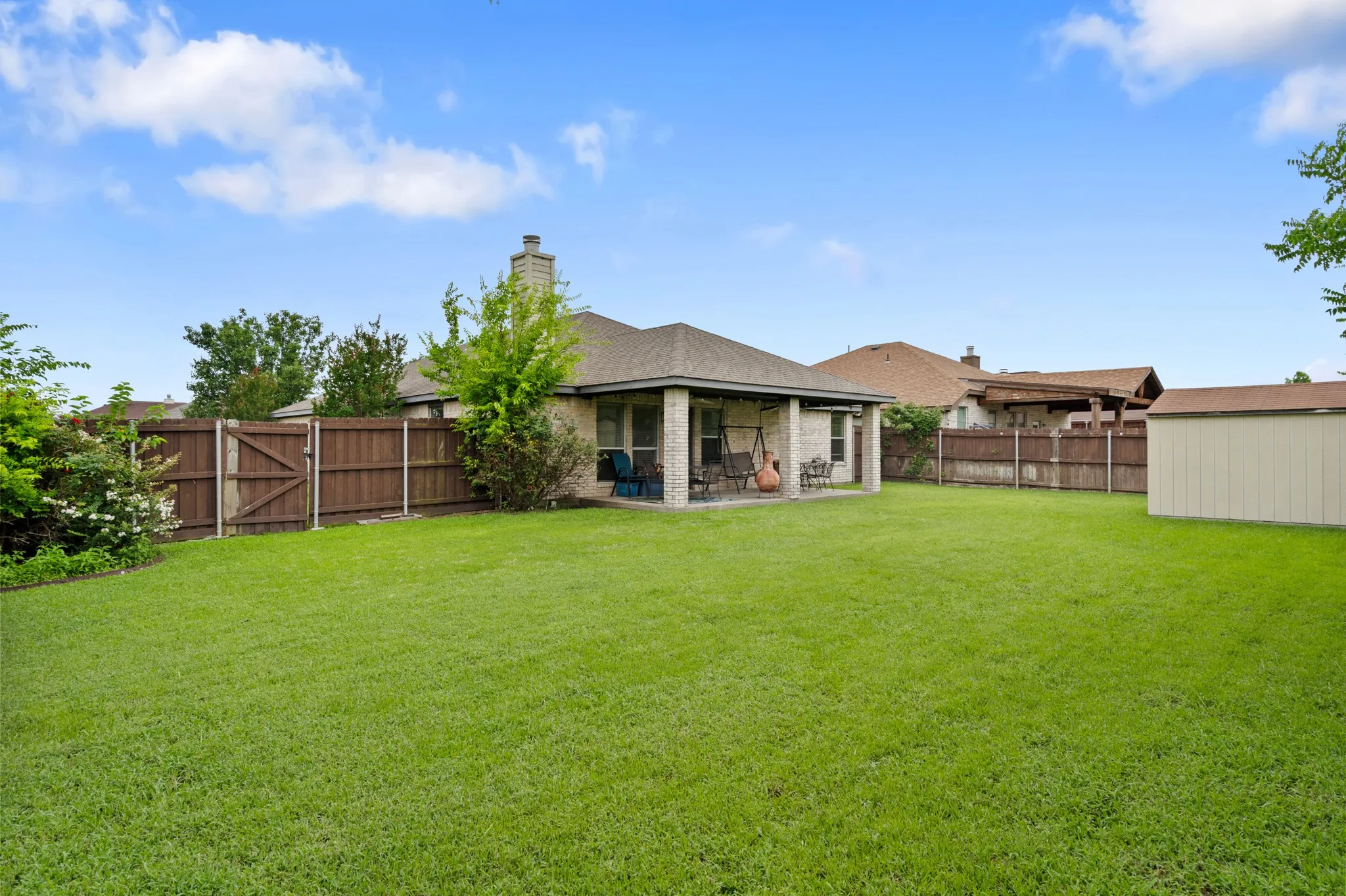 Back yard with covered patio
