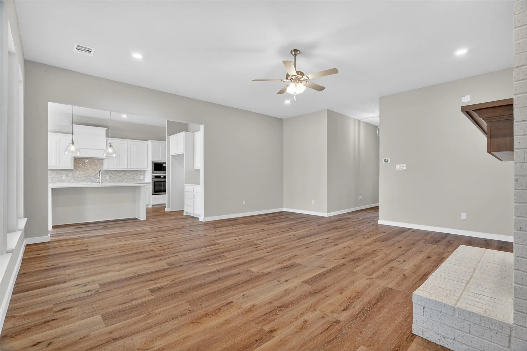 Spacious living room with plenty of natural light! The space allows for multiple living room configurations.