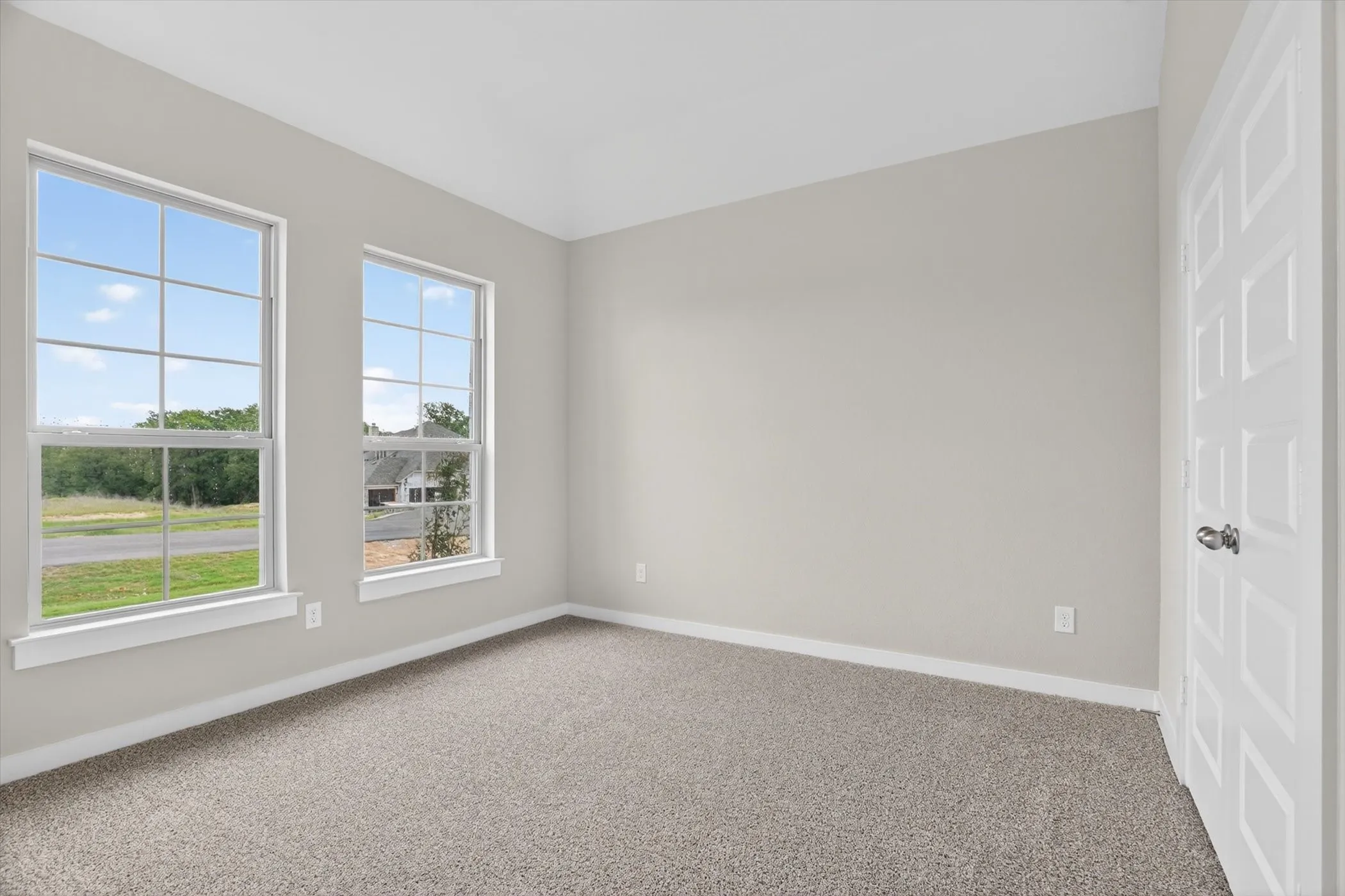Secondary bedroom with oversized windows to allow for natural light!