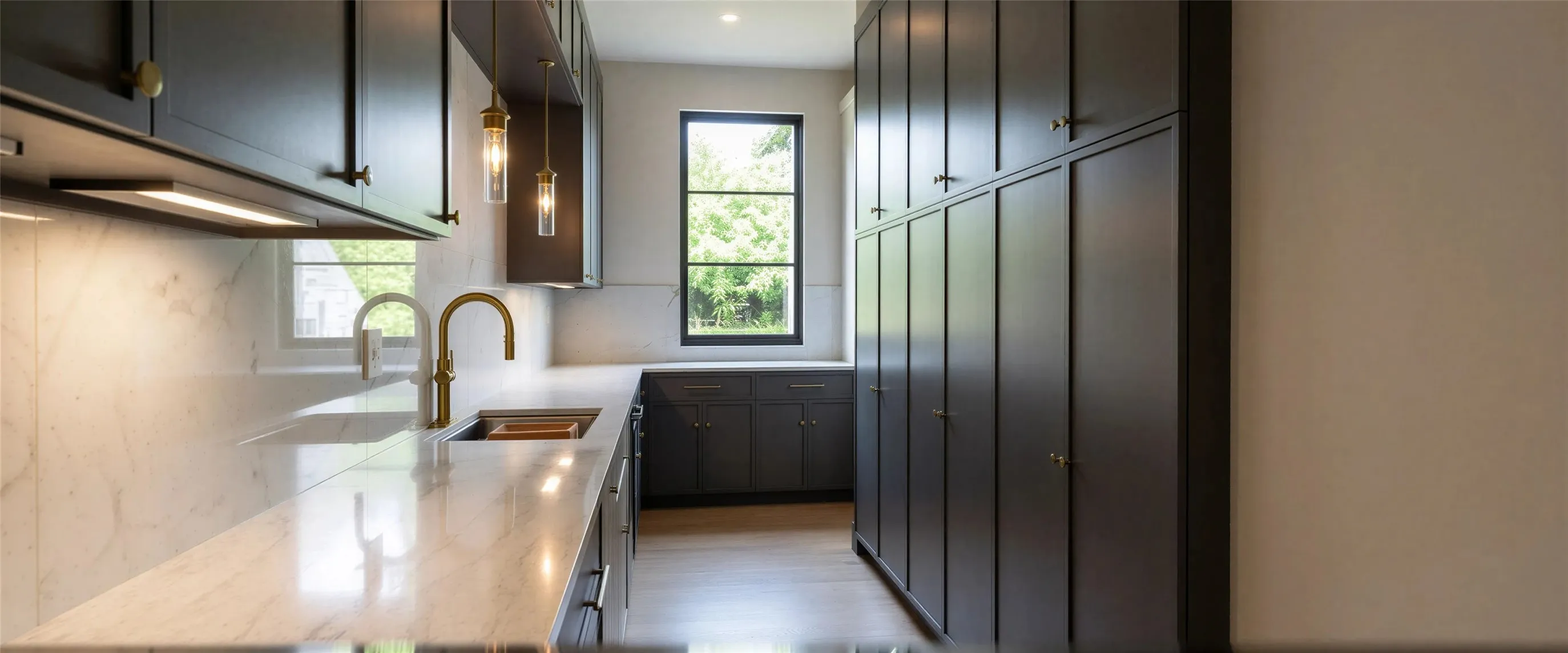 Kitchen featuring light stone countertops