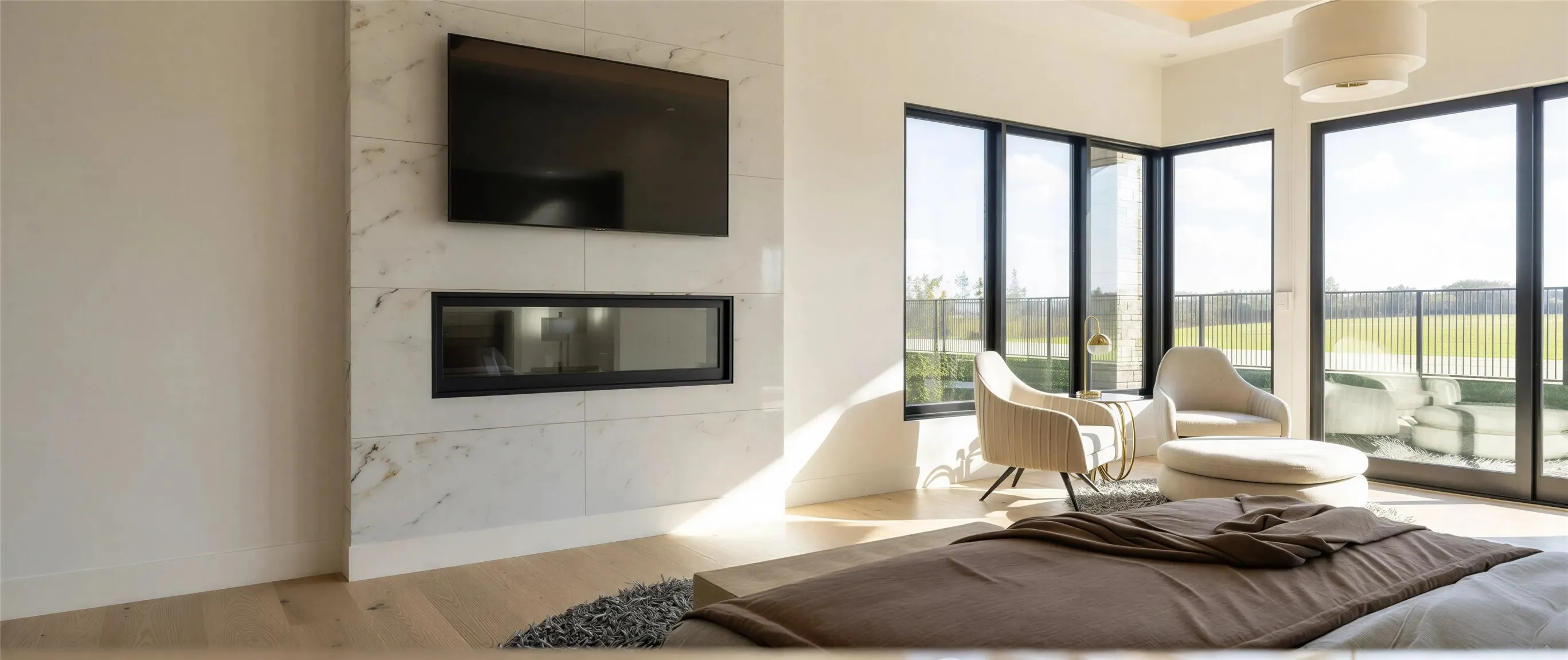 Living area with wood finished floors and a high end fireplace
