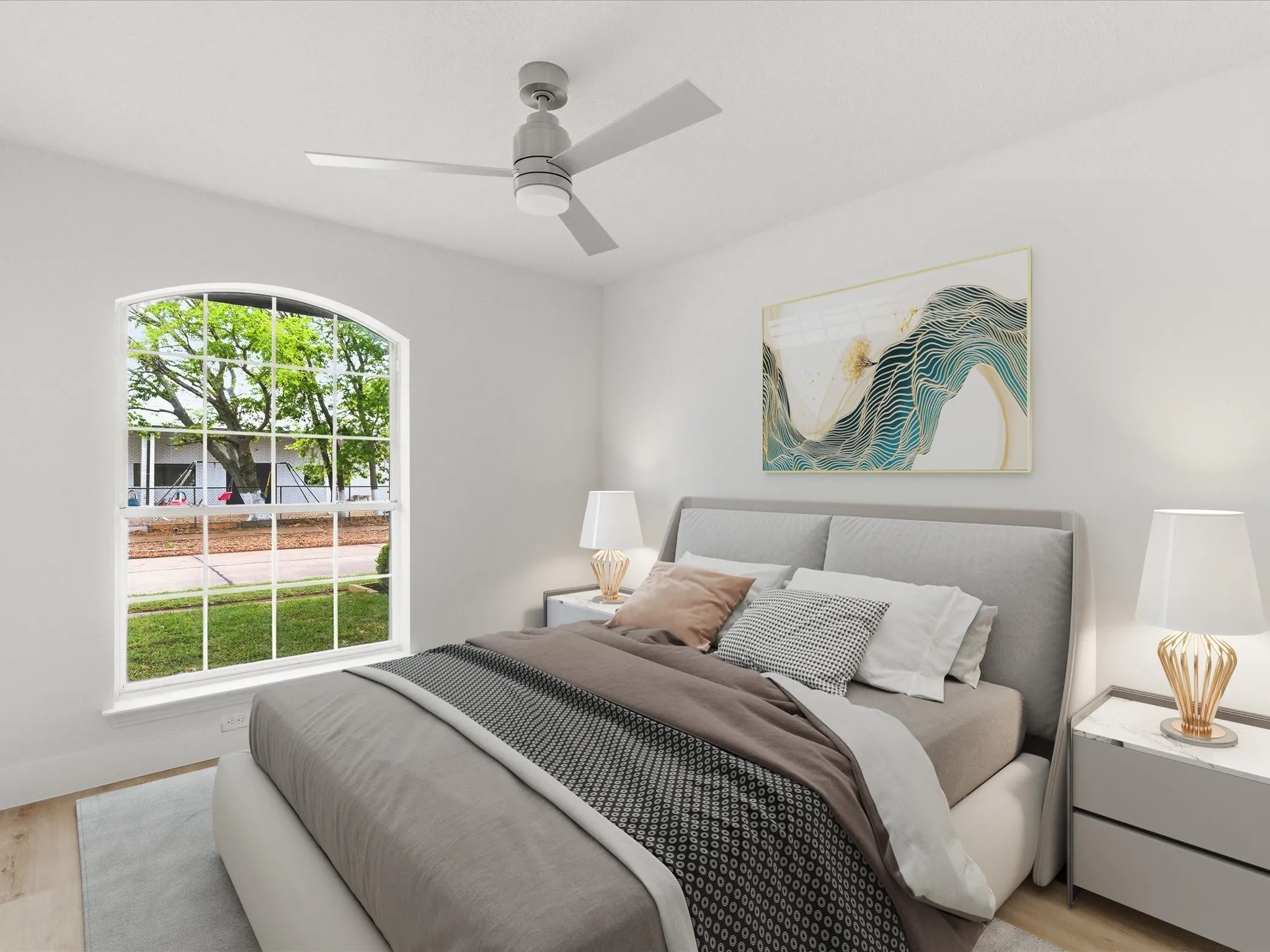 Bedroom with light wood-style floors and ceiling fan