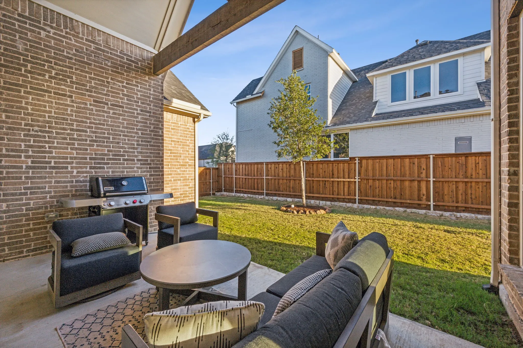 View of yard with outdoor lounge area and a patio area