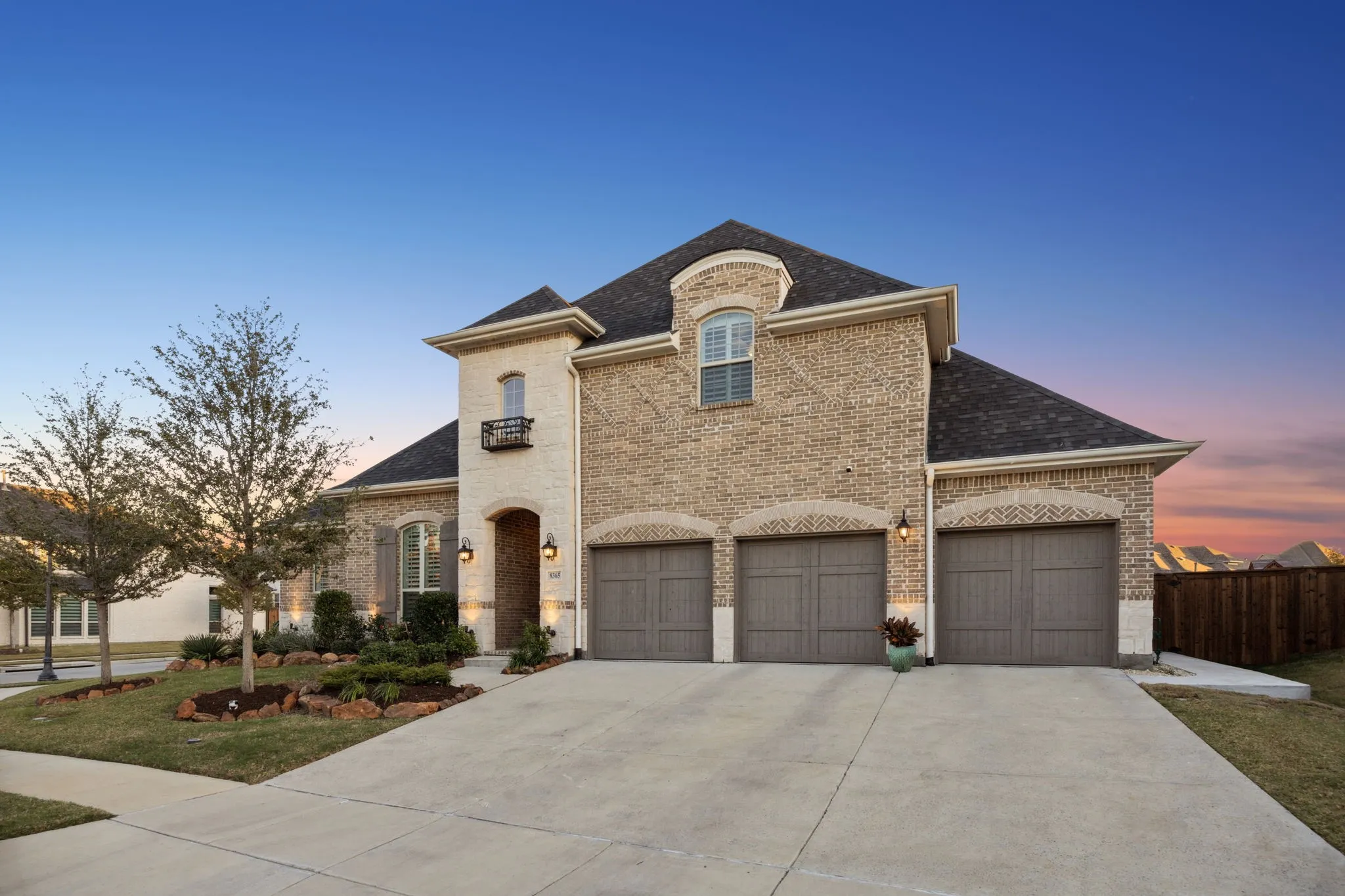 French country home with a garage