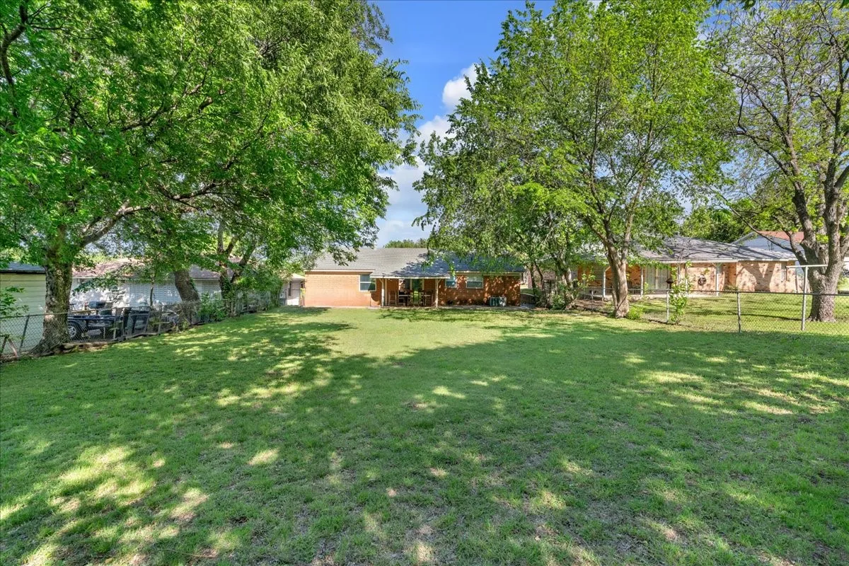 View of fenced backyard