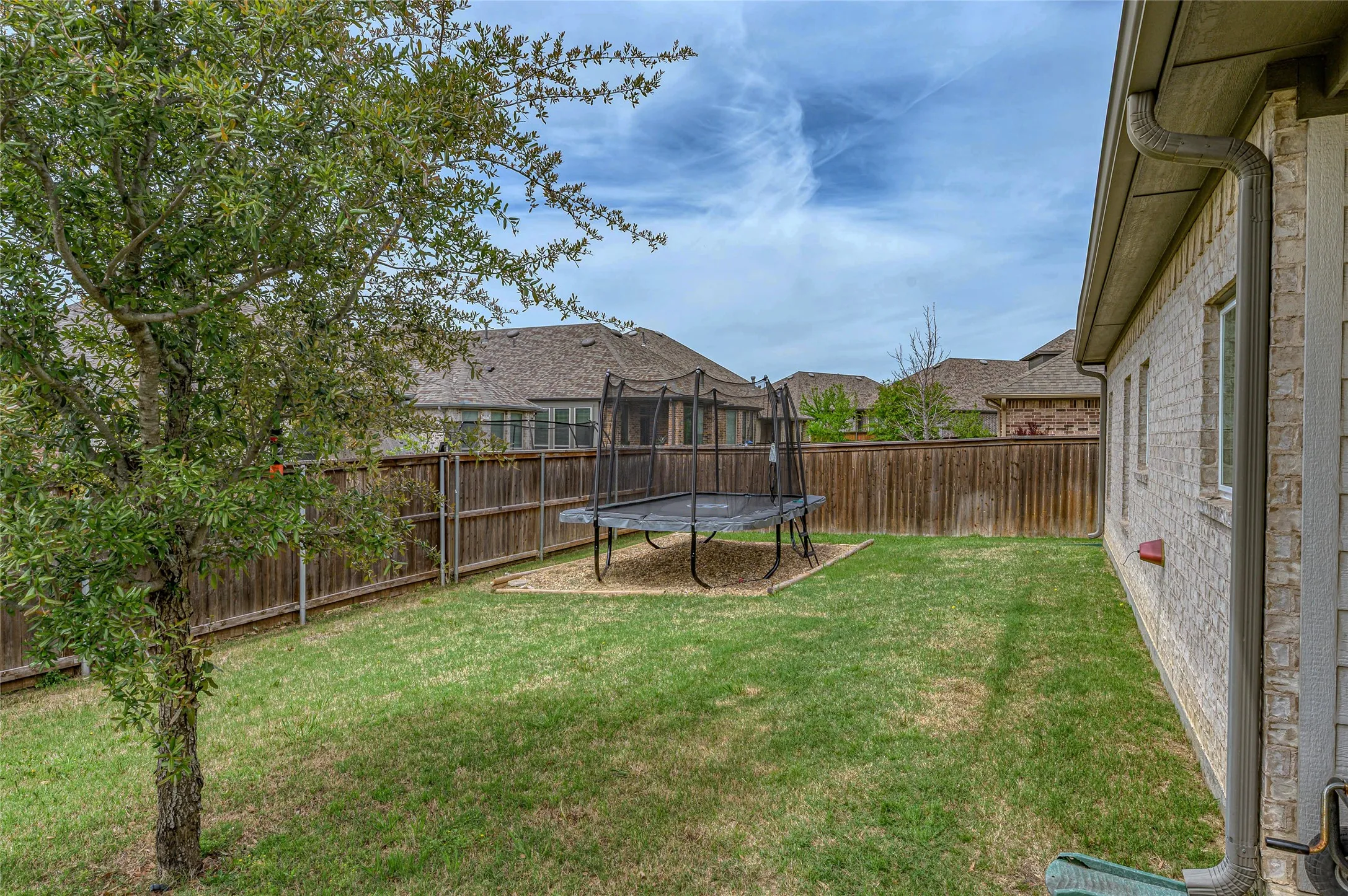 Fenced in yard with enough room to play