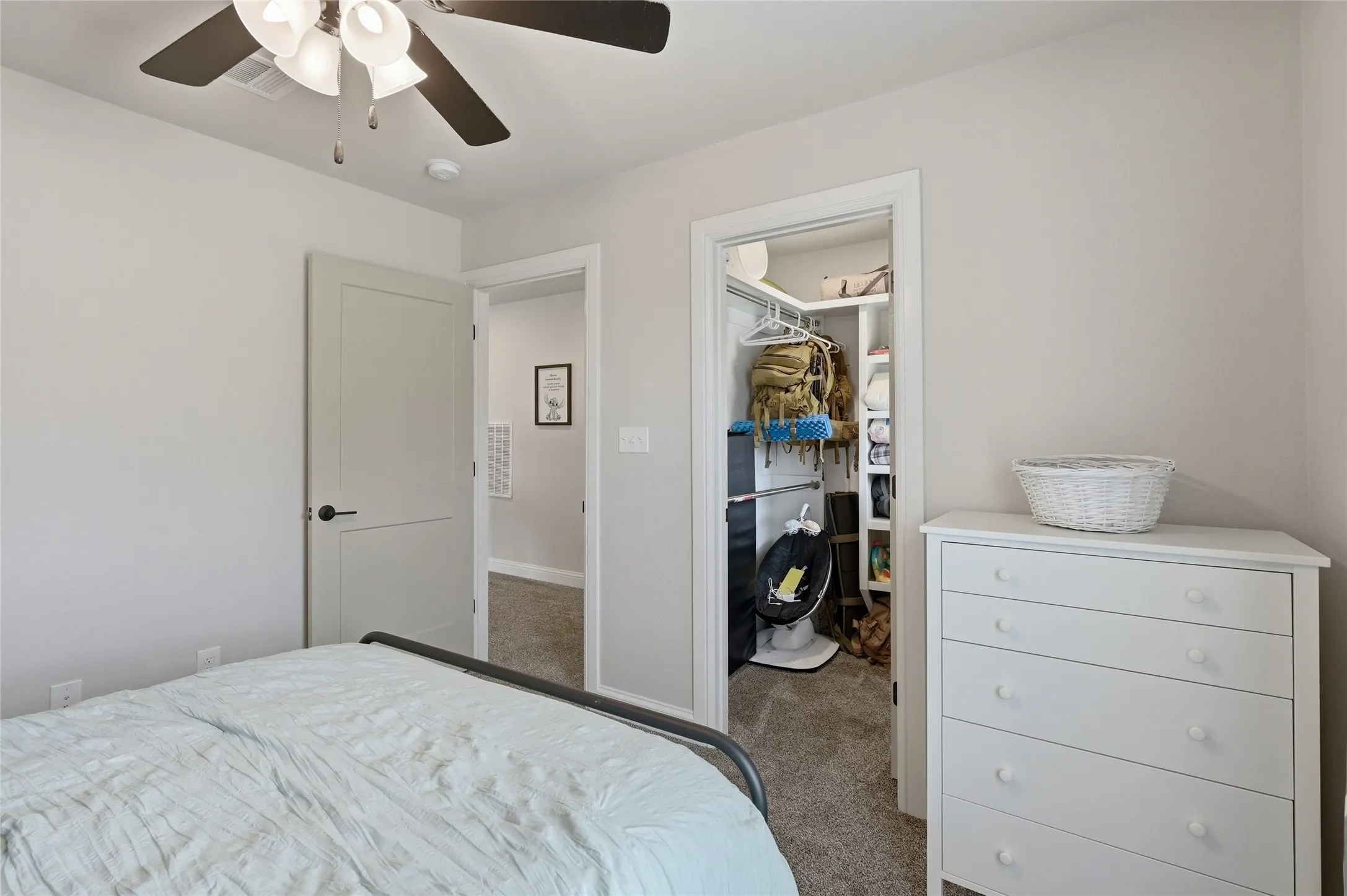 Walk in Closet with it's own window looking toward the front of the house
